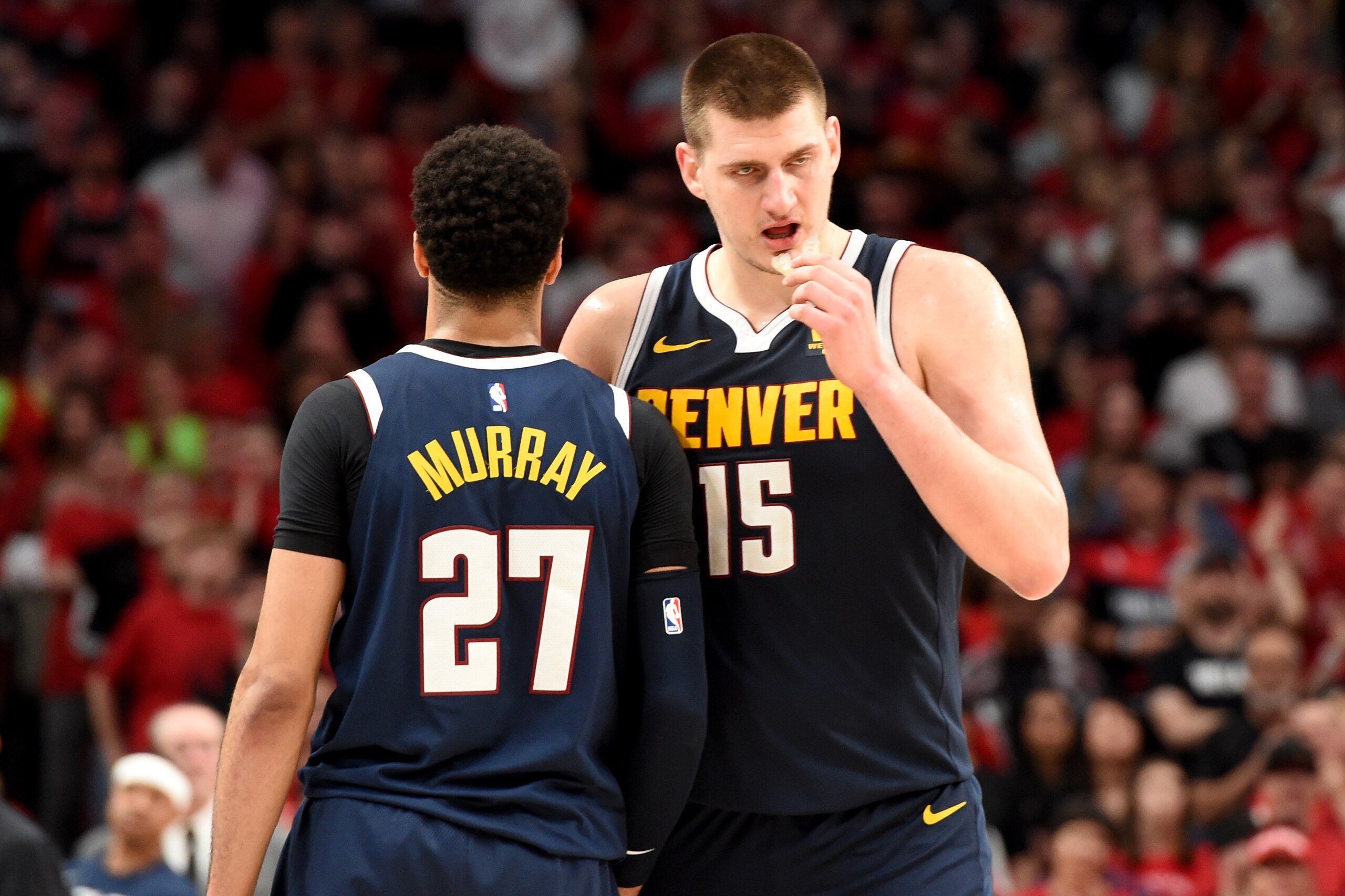 PORTLAND, OREGON - MAY 05: Jamal Murray #27 speaks with teammate Nikola Jokic #15 of the Denver Nuggets during the second half of game four of the Western Conference Semifinals against the Portland Trail Blazers at Moda Center on May 05, 2019 in Portland, PORTLAND, OREGON - MAY 05: Jamal Murray #27 speaks with teammate Nikola Jokic #15 of the Denver Nuggets during the second half of game four of the Western Conference Semifinals against the Portland Trail Blazers at Moda Center on May 05, 2019 in Portland,