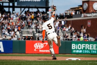 SAN FRANCISCO, CA - JULY 21: Mike Yastrzemski #5 of the San Francisco Giants rounds the bases after hitting a walk-off home run against the New York Mets during the twelfth inning at Oracle Park on July 21, 2019 in San Francisco, California. The San Franc