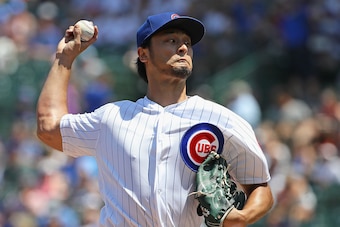 CHICAGO, ILLINOIS - JULY 17: Starting pitcher Yu Darvish #11 of the Chicago Cubs delivers the ball against the Cincinnati Reds at Wrigley Field on July 17, 2019 in Chicago, Illinois. (Photo by Jonathan Daniel/Getty Images)