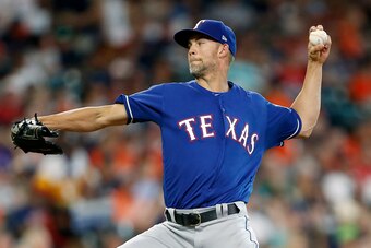 HOUSTON, TEXAS - JULY 19: Mike Minor #23 of the Texas Rangers pitches in the first inning against the Houston Astros at Minute Maid Park on July 19, 2019 in Houston, Texas. (Photo by Bob Levey/Getty Images)
