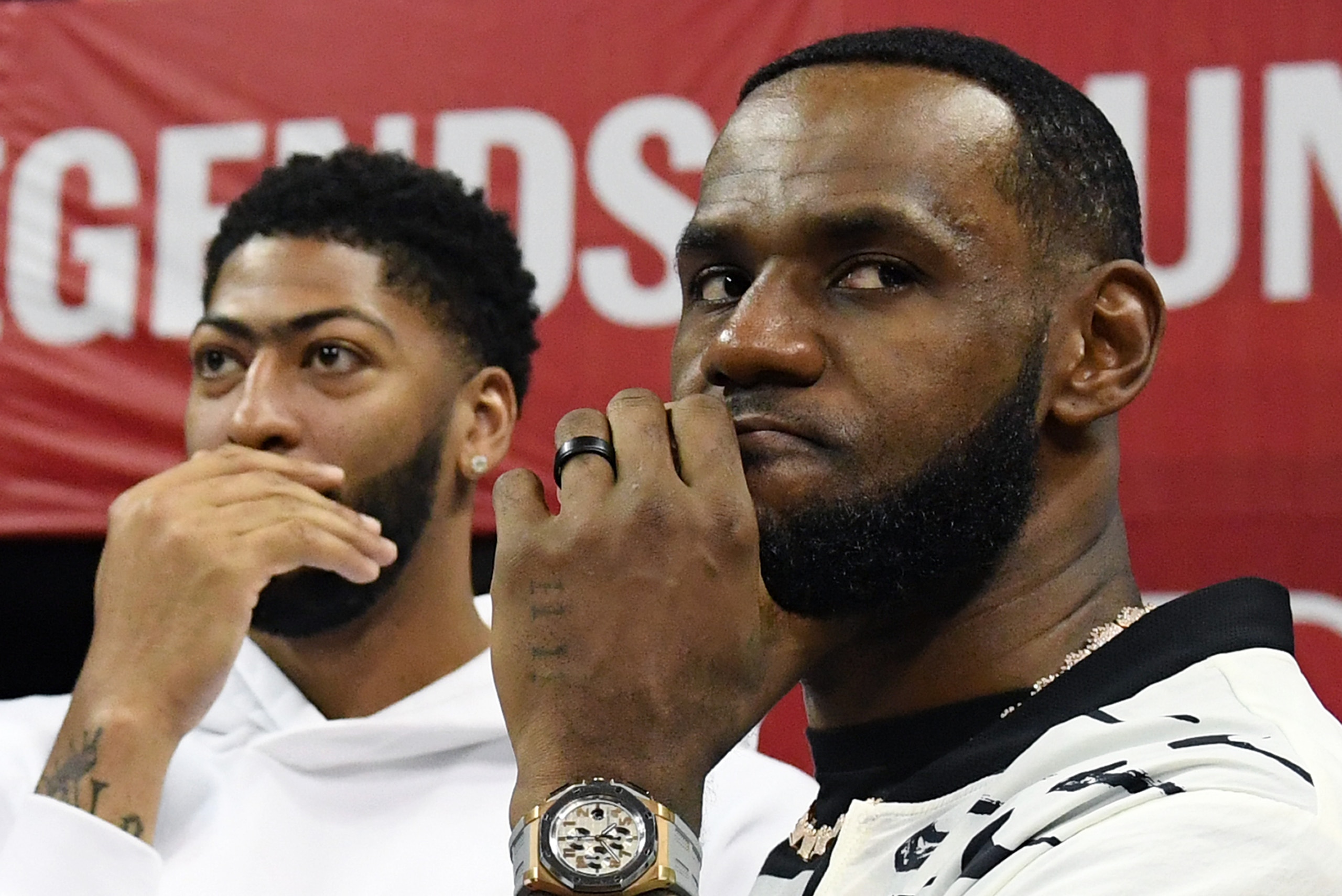 LAS VEGAS, NEVADA - JULY 06:  Anthony Davis (L) and LeBron James of the Los Angeles Lakers arrive at a game between the Lakers and the LA Clippers during the 2019 NBA Summer League at the Thomas & Mack Center on July 6, 2019 in Las Vegas, Nevada. NOTE TO 