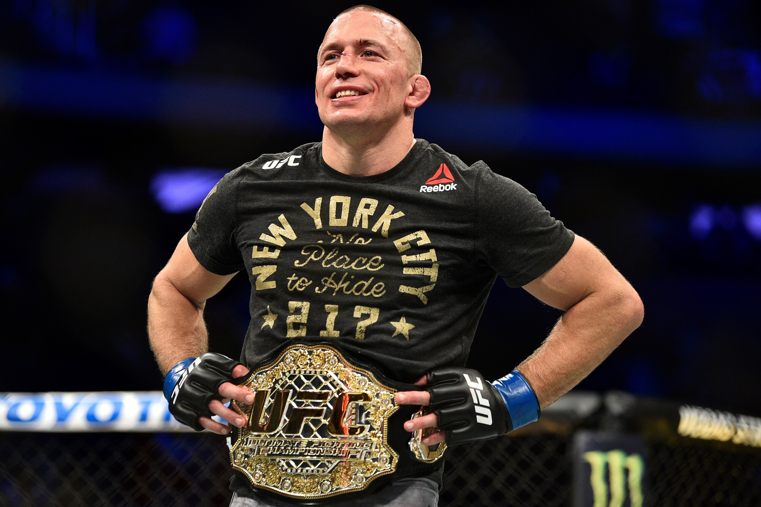 NEW YORK, NY - NOVEMBER 04:  Georges St-Pierre of Canada celebrates after defeating Michael Bisping of England in their UFC middleweight championship bout during the UFC 217 event inside Madison Square Garden on November 4, 2017 in New York City. (Photo b