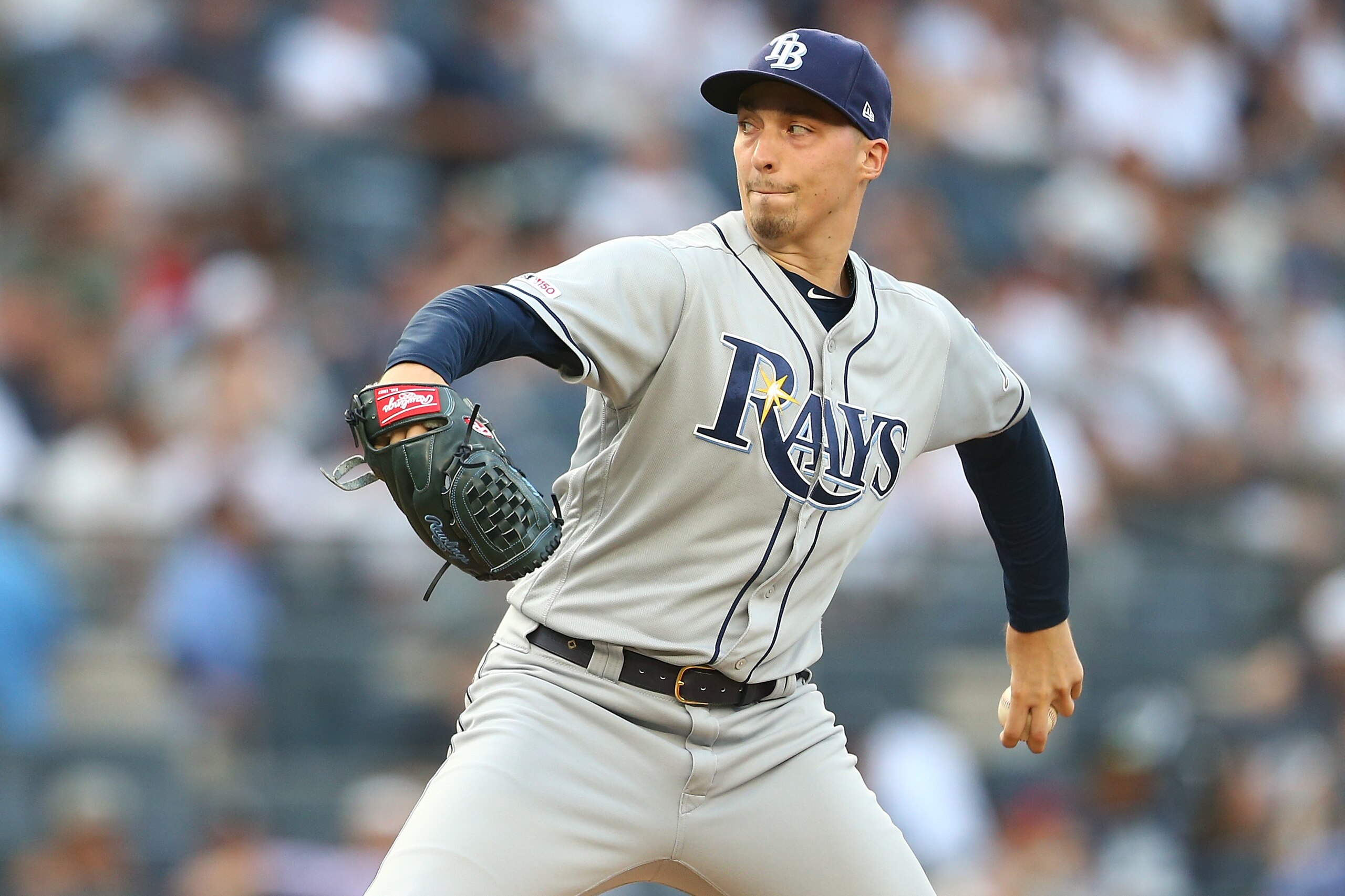 NEW YORK, NEW YORK - JULY 15:  Blake Snell #4 of the Tampa Bay Rays in action against the New York Yankees at Yankee Stadium on July 15, 2019 in New York City. Tampa Bay Rays defeated the New York Yankees 5-4. (Photo by Mike Stobe/Getty Images)