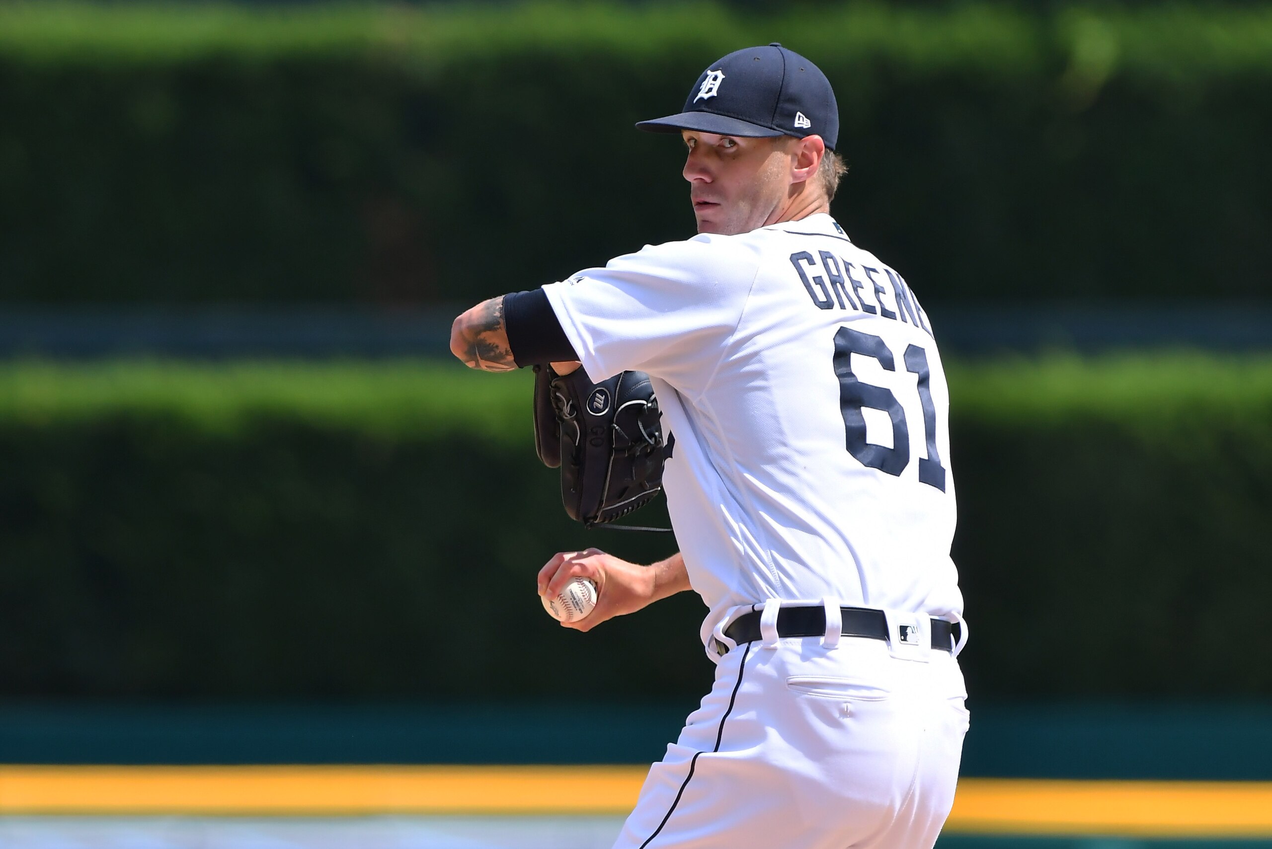 DETROIT, MI - JULY 21:  Shane Greene #61 of the Detroit Tigers throws a warm-up pitch during the game against the Toronto Blue Jays at Comerica Park on July 21, 2019 in Detroit, Michigan. The Tigers defeated the Blue Jays 4-3 in ten innings.  (Photo by Ma