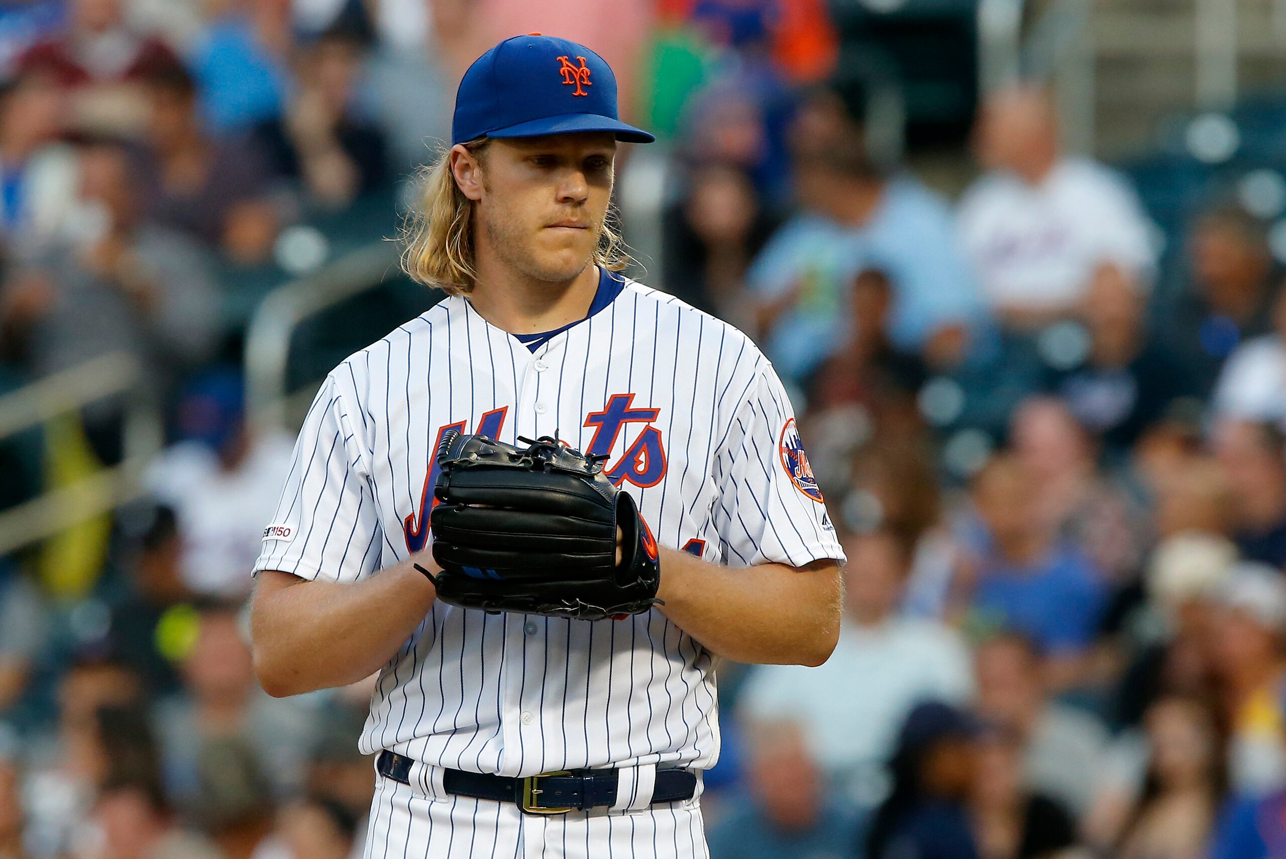 NEW YORK, NEW YORK - JULY 24:   Noah Syndergaard #34 of the New York Mets in action against the San Diego Padres at Citi Field on July 24, 2019 in New York City.  The Padres defeated the Mets 7-2. (Photo by Jim McIsaac/Getty Images)