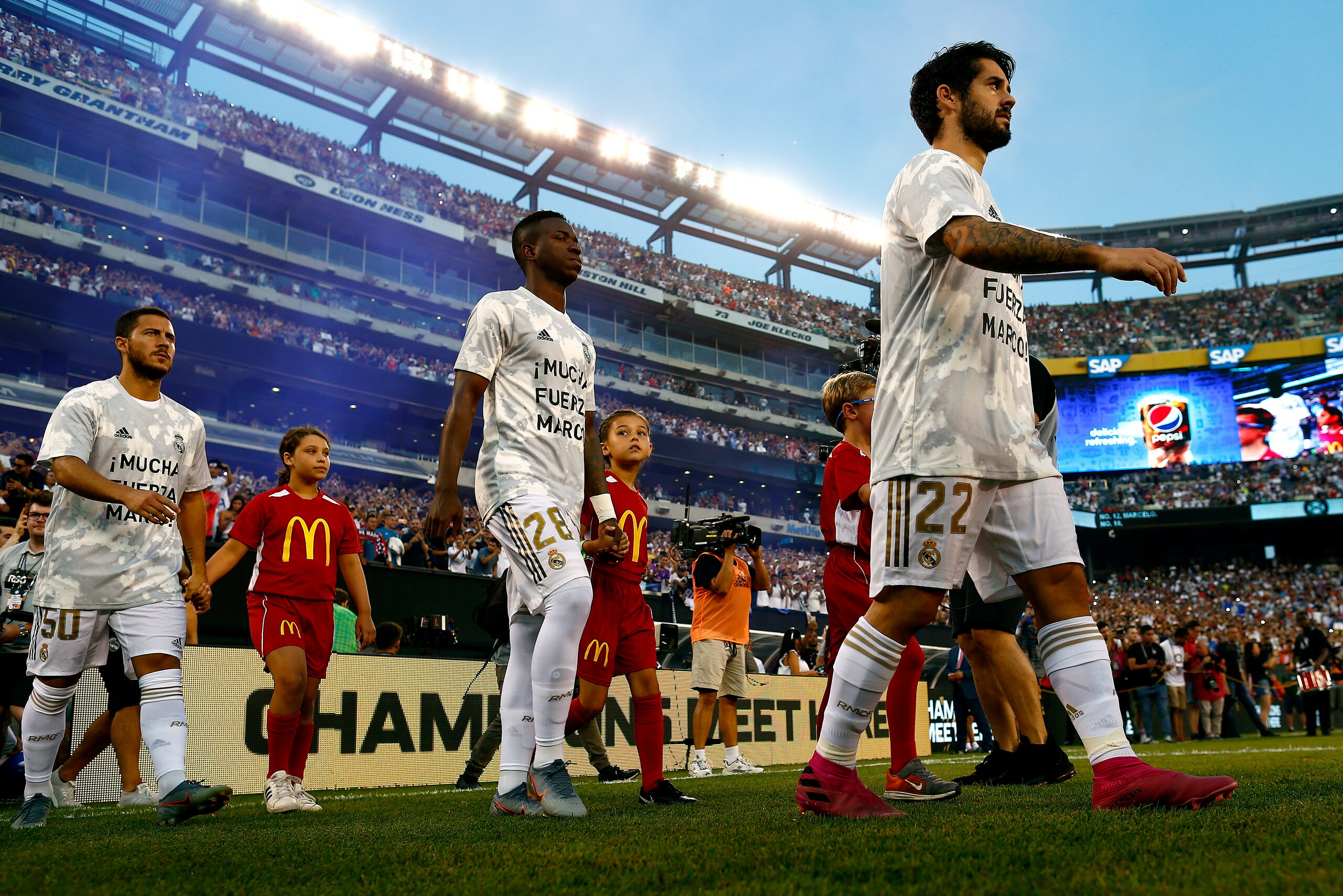 EAST RUTHERFORD, NEW JERSEY - JULY 26:  Francisco Roman Alarcon Suarez #22, Vinicius Junior #28 and Eden Hazard #50 of Real Madrid take the field prior to the International Champions Cup match at MetLife Stadium on July 26, 2019 in East Rutherford, New Je