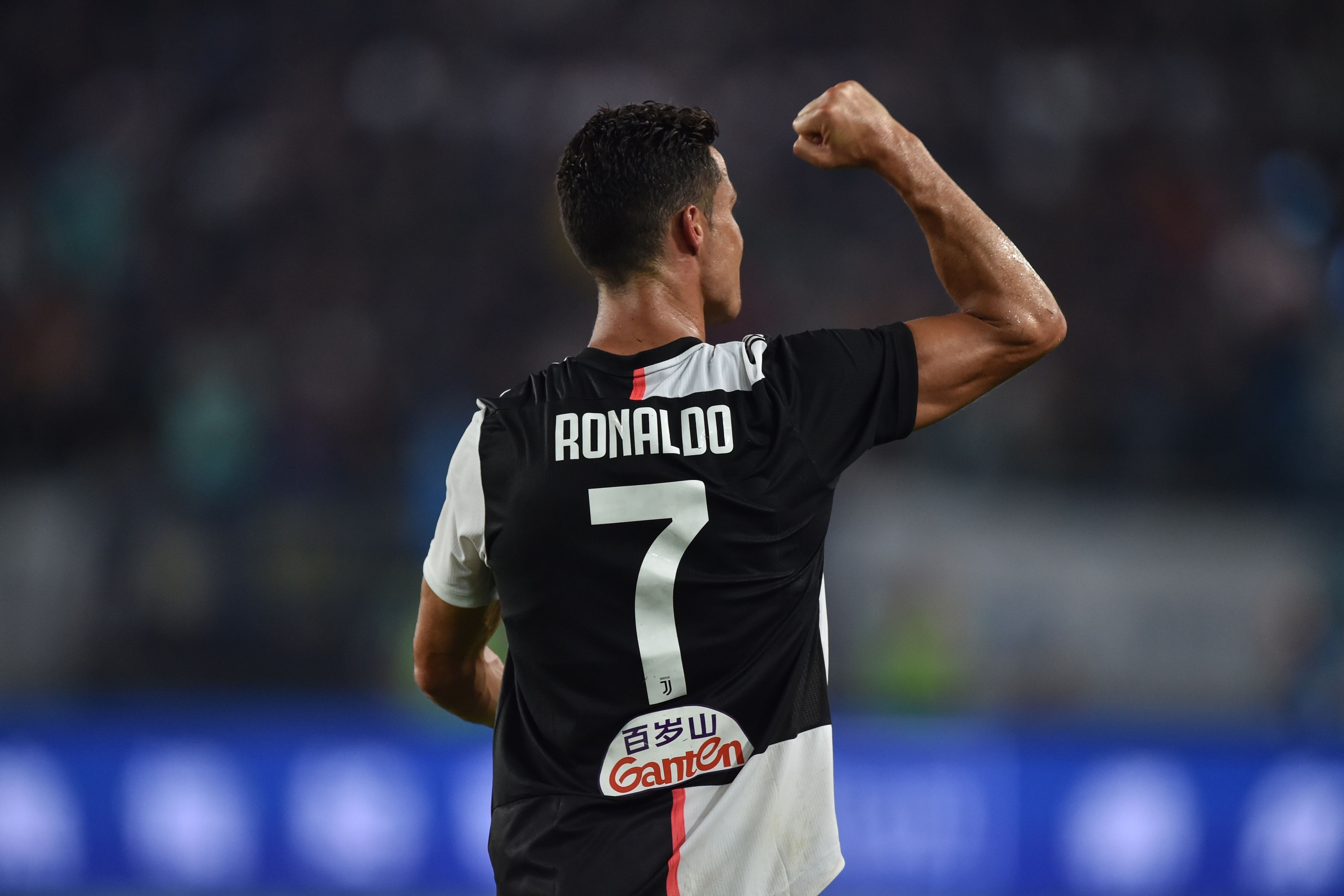 Juventus's Cristiano Ronaldo celebrates after scoring against Inter Milan during the International Champions Cup football tournament at the Nanjing Olympic Sport Center in Nanjing in China's Jiangsu province on July 24, 2019. (Photo by HECTOR RETAMAL / AF