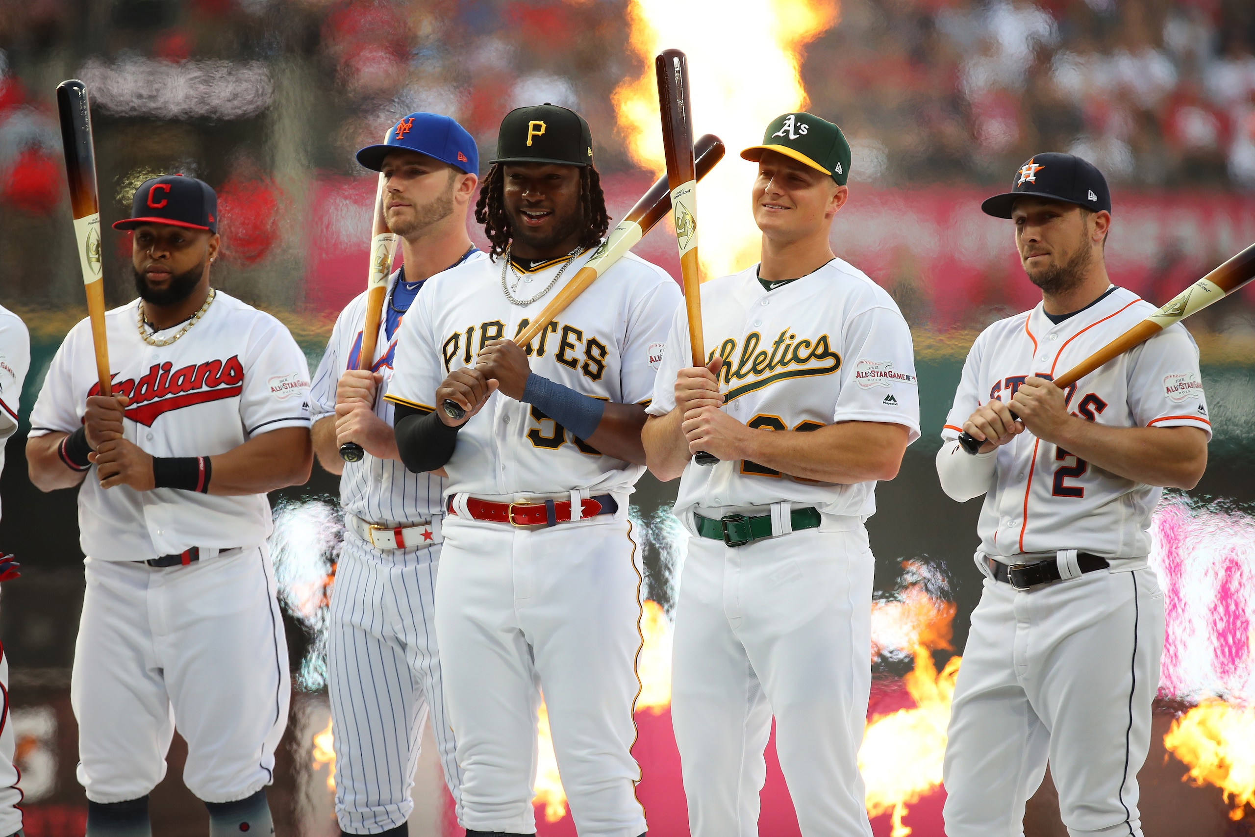 CLEVELAND, OHIO - JULY 08: Carlos Santana of the Cleveland Indians, Pete Alonso of the New York Mets, Josh Bell of the Pittsburgh Pirates, Matt Chapman of the Oakland Athletics, and Alex Bregman of the Houston Astros stand prior to the T-Mobile Home Run D