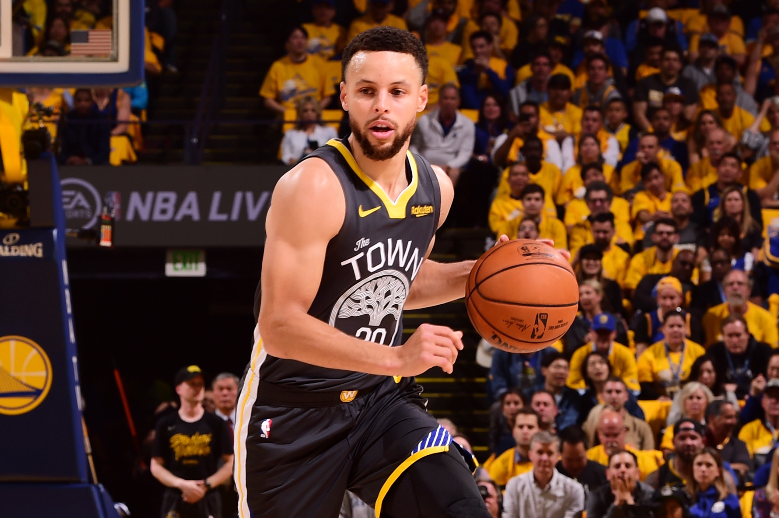 OAKLAND, CA - APRIL 30:  Stephen Curry #30 of the Golden State Warriors handles the ball against the Houston Rockets during Game Two of the Western Conference Semifinals of the 2019 NBA Playoffs on April 30, 2019 at ORACLE Arena in Oakland, California. NO
