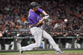 SAN FRANCISCO, CA - SEPTEMBER 19:  DJ LeMahieu #9 of the Colorado Rockies bats against the San Francisco Giants in the top of the second inning at AT&T Park on September 19, 2017 in San Francisco, California.  (Photo by Thearon W. Henderson/Getty Images)