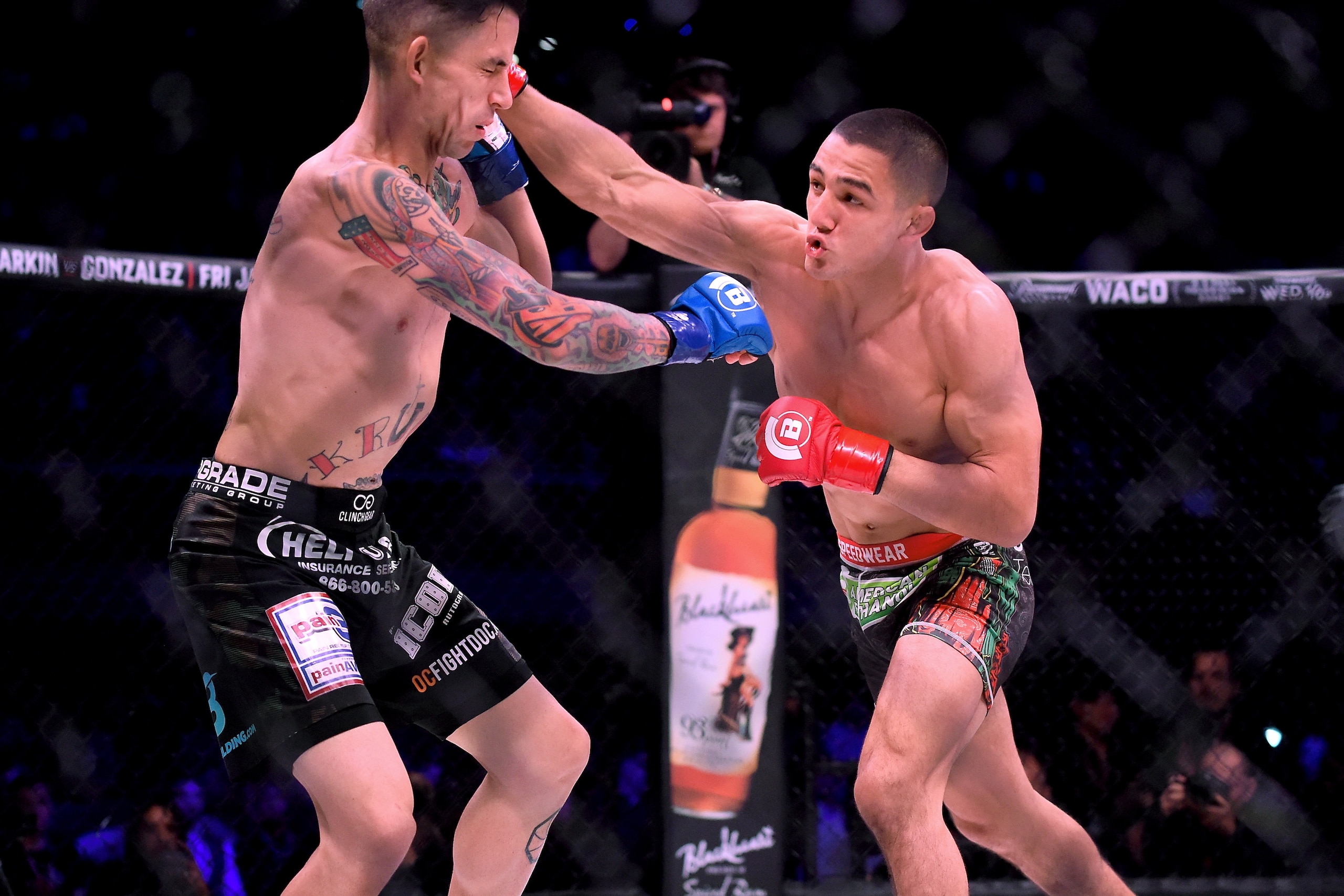 INGLEWOOD, CA - JANUARY 20:  Aaron Pico (red gloves) defeated Shane  Kruchten (blue gloves) by knockout in the first round of their during their Featherweight fight at Bellator 192 at The Forum on January 20, 2018 in Inglewood, California.  (Photo by Jayn