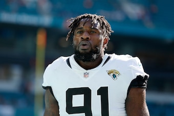 MIAMI, FL - DECEMBER 23:  Yannick Ngakoue #91 of the Jacksonville Jaguars looks on against the Miami Dolphins at Hard Rock Stadium on December 23, 2018 in Miami, Florida.  (Photo by Michael Reaves/Getty Images)