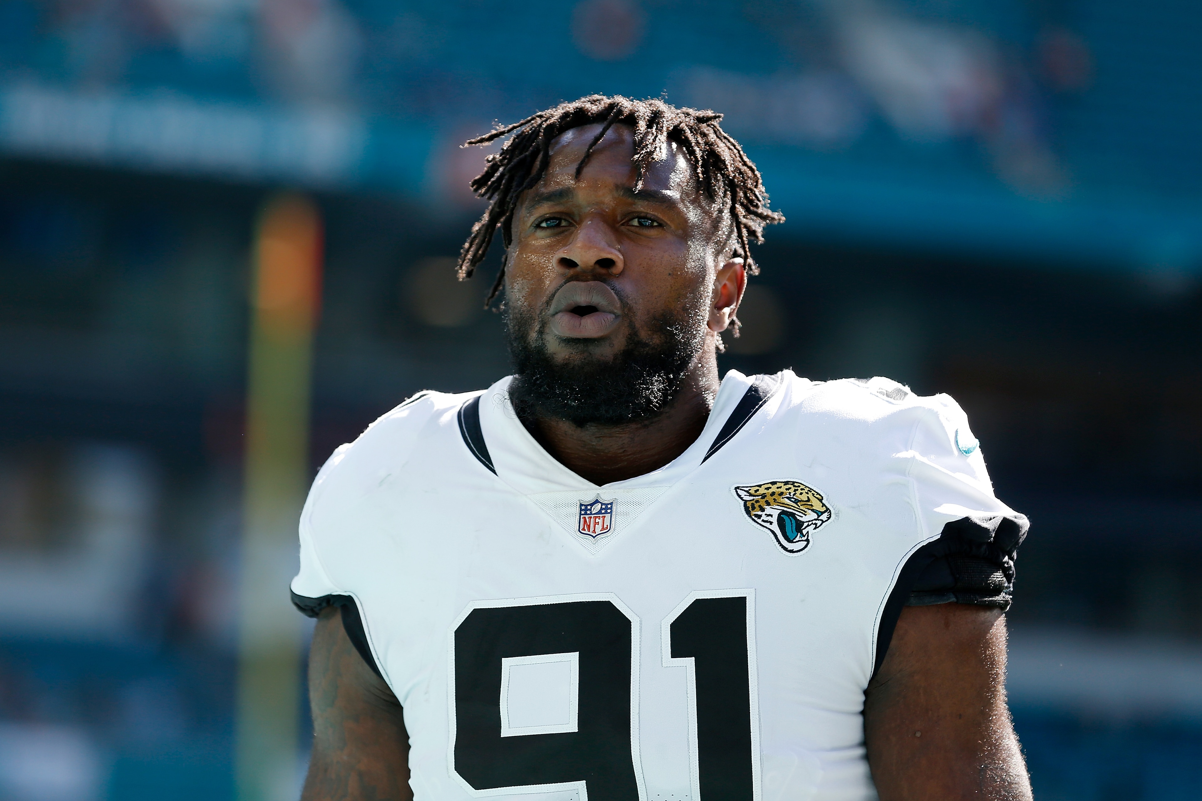 MIAMI, FL - DECEMBER 23:  Yannick Ngakoue #91 of the Jacksonville Jaguars looks on against the Miami Dolphins at Hard Rock Stadium on December 23, 2018 in Miami, Florida.  (Photo by Michael Reaves/Getty Images)