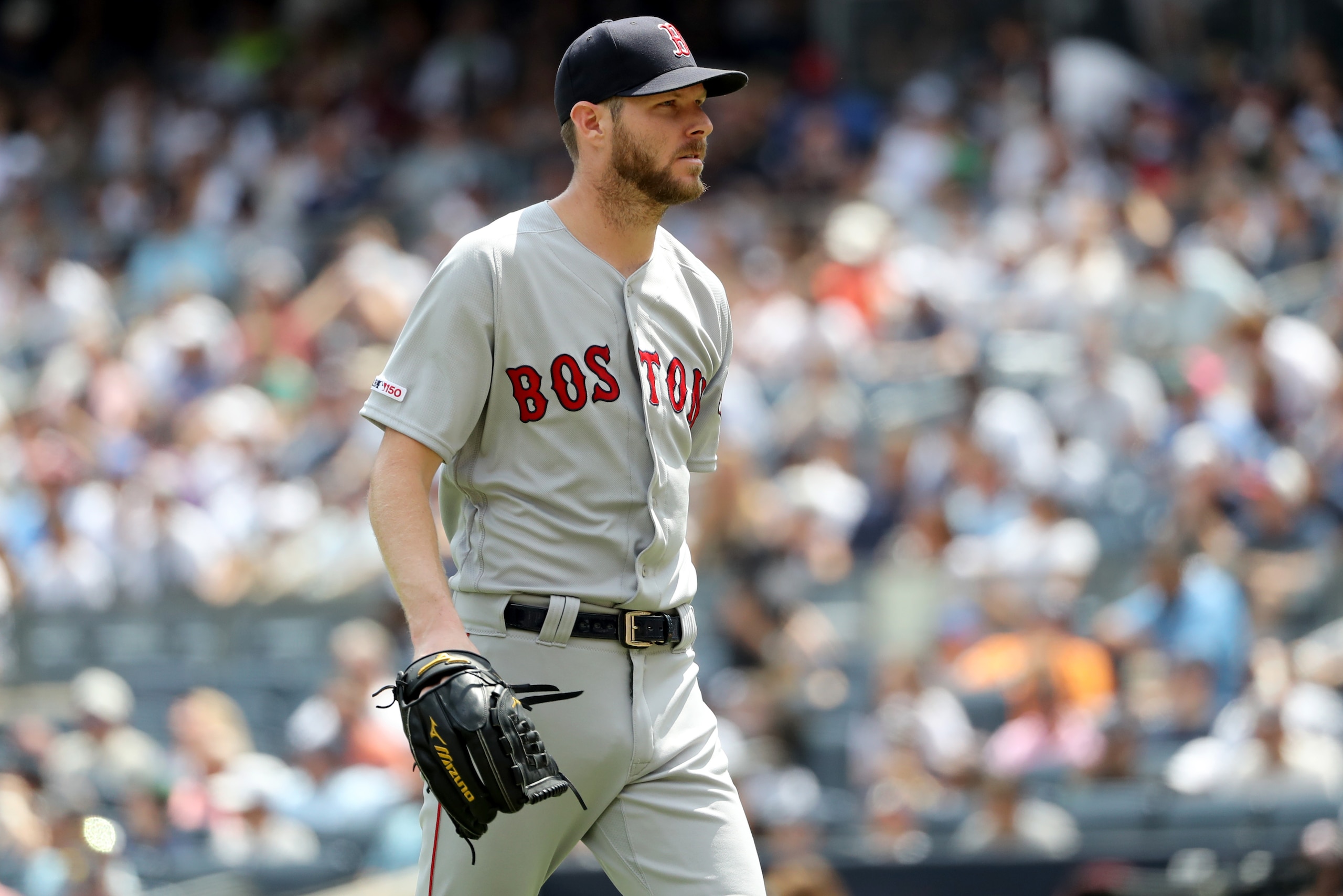 NEW YORK, NEW YORK - AUGUST 03: Chris Sale #41 of the Boston Red Sox walks off the field after the first inning against the New York Yankees during game one of a double header at Yankee Stadium on August 03, 2019 in the Bronx borough of New York City. (Ph