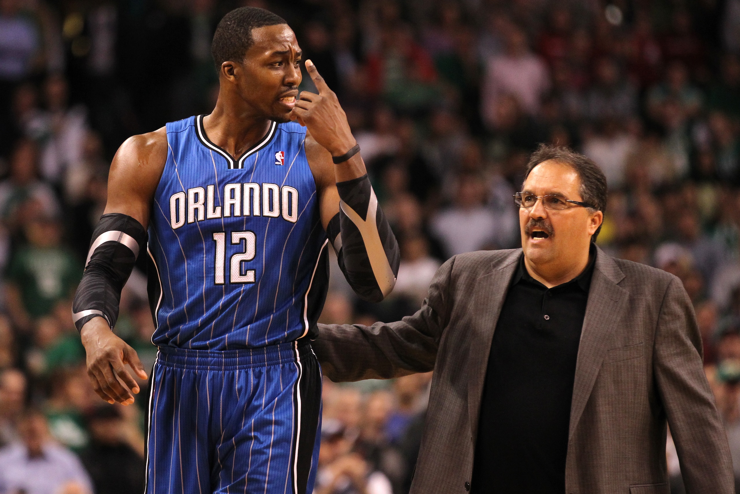 BOSTON, MA - JANUARY 23: Head Coach Stan Van Gundy talks to Dwight Howard #12 of the Orlando Magic during the game against the Boston Celtics on January 23, 2012 at the TD Garden in Boston, Massachusetts. NOTE TO USER: User expressly acknowledges and agre