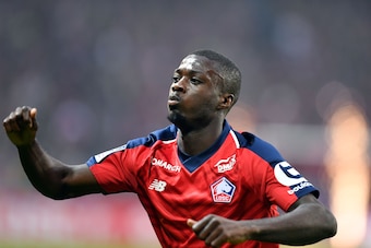 Lille's Ivorian forward Nicolas Pepe celebrates  after scoring a goal during the French L1 football match between Lille (LOSC) and Angers (SCO) at the Pierre-Mauroy Stadium in Villeneuve d'Ascq, near Lille, northern France, on May 18 2019. (Photo by DENIS