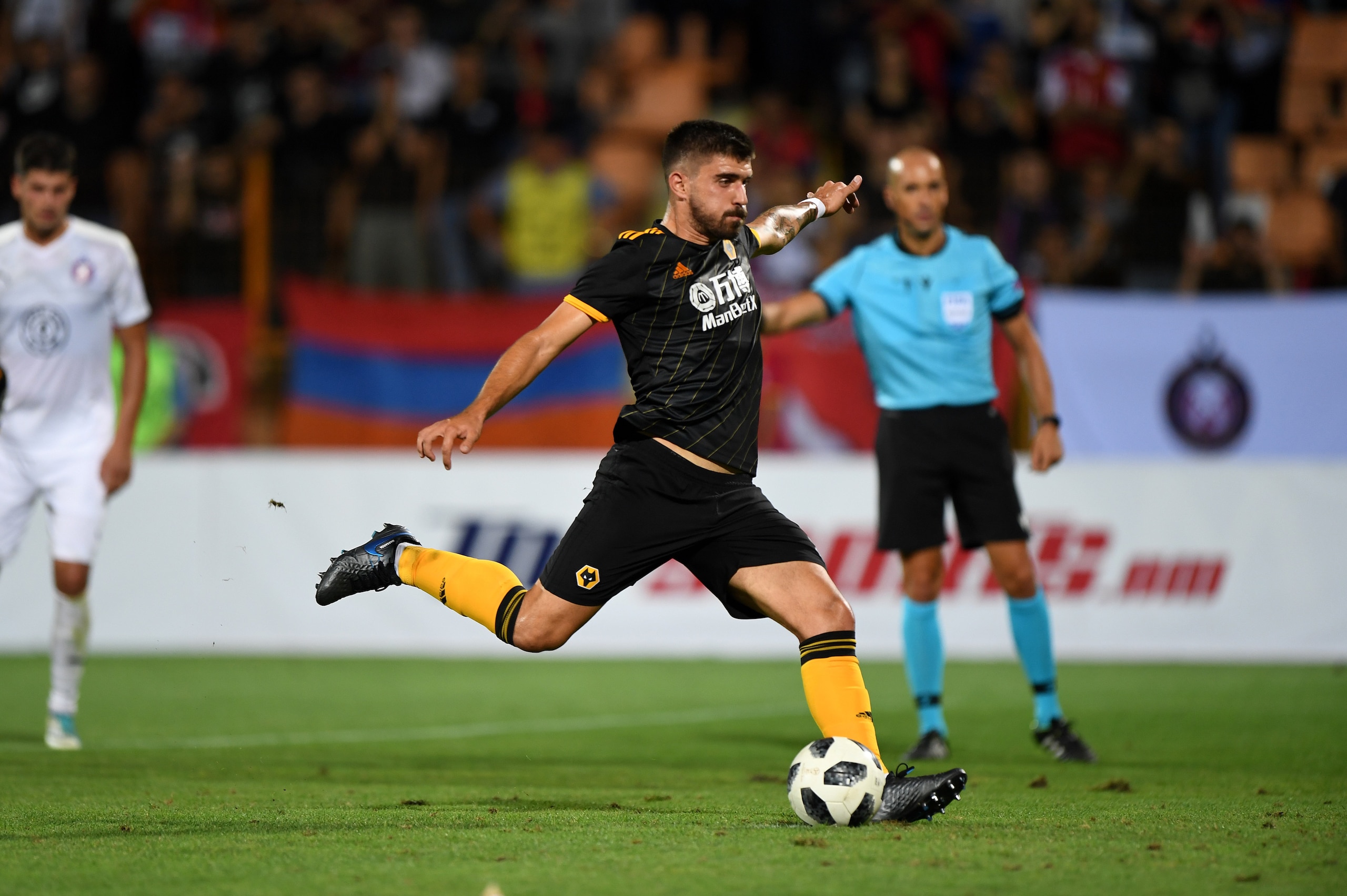 YEREVAN, ARMENIA - AUGUST 08: Ruben Neves of Wolverhampton Wanderers scores a goal to make it 0-4 from a penalty kick during the UEFA Europa League Third Qualifying Round First Leg fixture between FC Pyunik and Wolverhampton Wanderers at Pyunik Stadium on