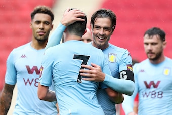 LONDON, ENGLAND - JULY 27:    John McGinn of Aston Villa celebrates with Jack Grealish of Aston Villa after he scores his sides fourth goal during the Pre-Season Friendly match between Charlton Athletic and Aston Villa at The Valley on July 27, 2019 in Lo