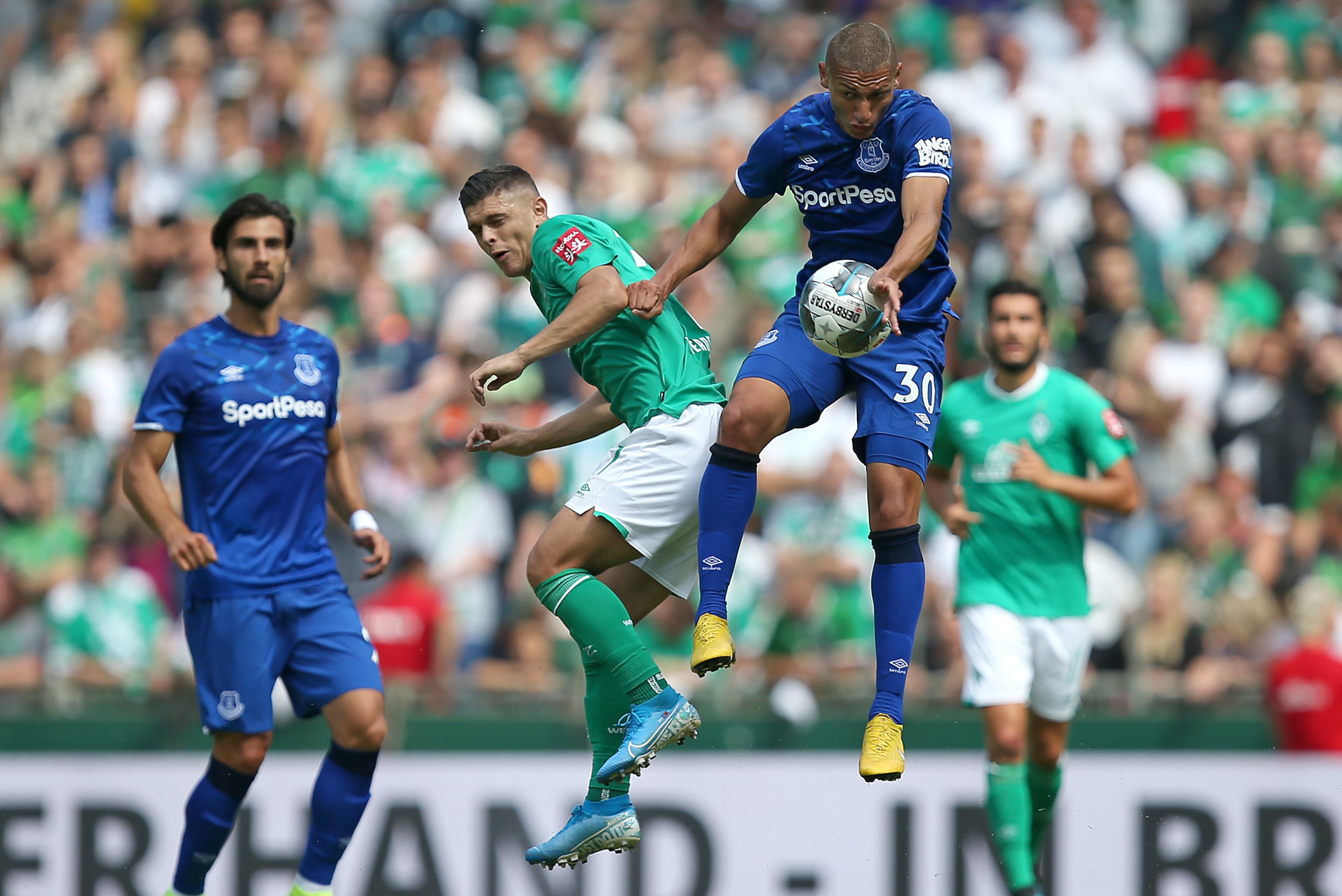 BREMEN, GERMANY - AUGUST 03: (L-R) Milot Rashica of Werder Bremen and Richarlison De Andrade of FC Everton battle for the ball during the pre-season friendly match between SV Werder Bremen and FC Everton at Wohninvest Weserstadion on August 03, 2019 in Br
