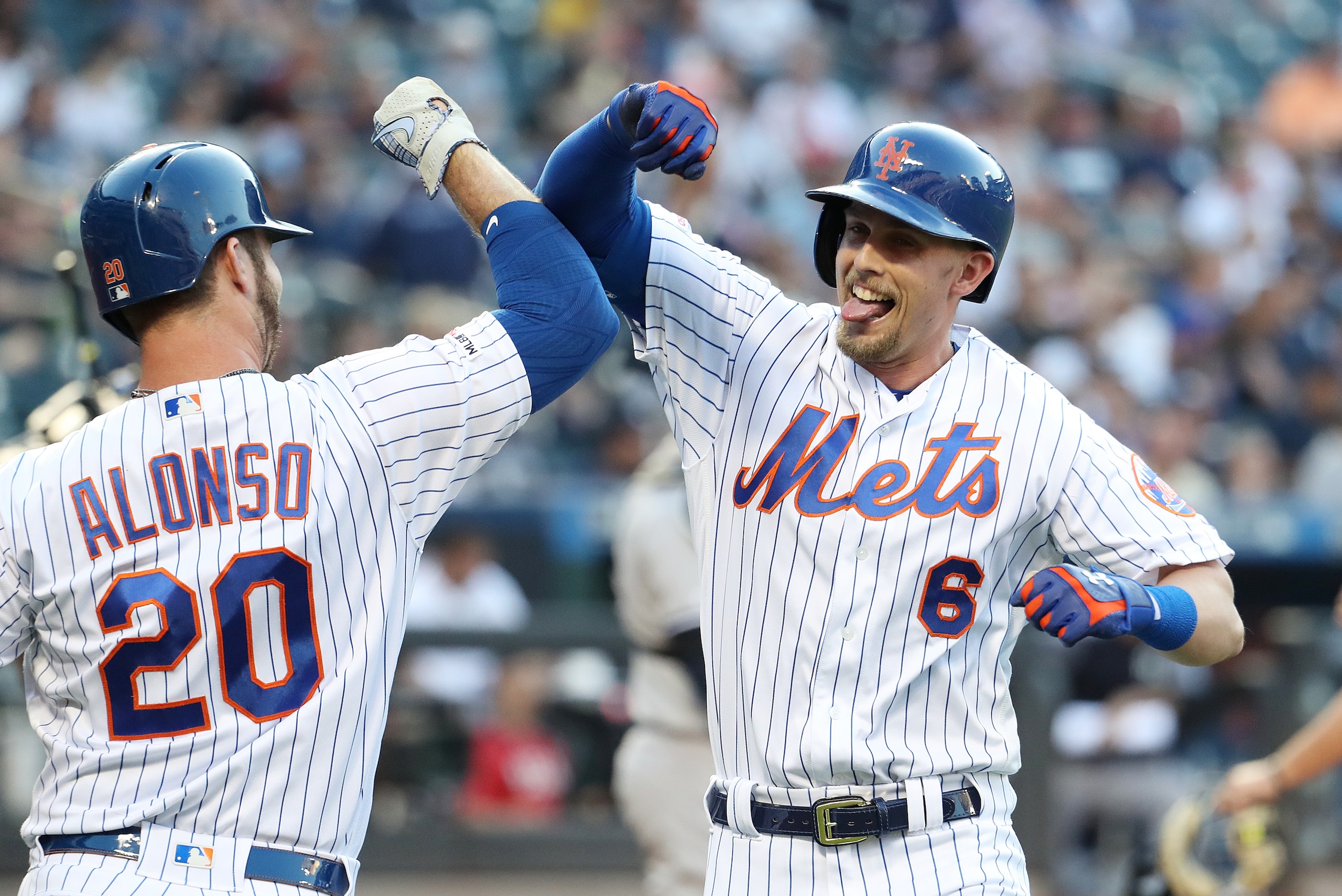 NEW YORK, NEW YORK - JULY 03:  Jeff McNeil #6 of the New York Mets celebrates his first inning home run with Pete Alonso #20 of the New York Mets against the New York Yankeesduring their game at Citi Field on July 03, 2019 in New York City. (Photo by Al B