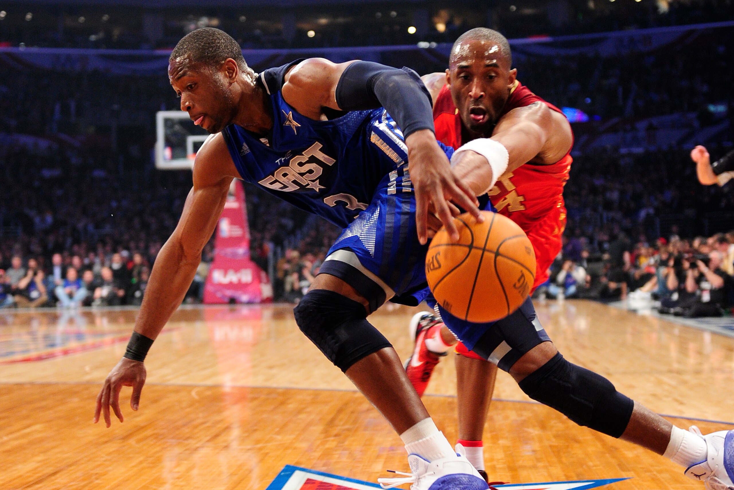 West Team's Kobe Bryant of the L.A. Lakers (R) steals the ball from East Team's Dwyane Wade of the Miami Heat as he drives to the basket during the NBA All-Star Game February 20, 2011, part of NBA All-Star Weekend at Staples Center in Los Angeles, Califor West Team's Kobe Bryant of the L.A. Lakers (R) steals the ball from East Team's Dwyane Wade of the Miami Heat as he drives to the basket during the NBA All-Star Game February 20, 2011, part of NBA All-Star Weekend at Staples Center in Los Angeles, Califor