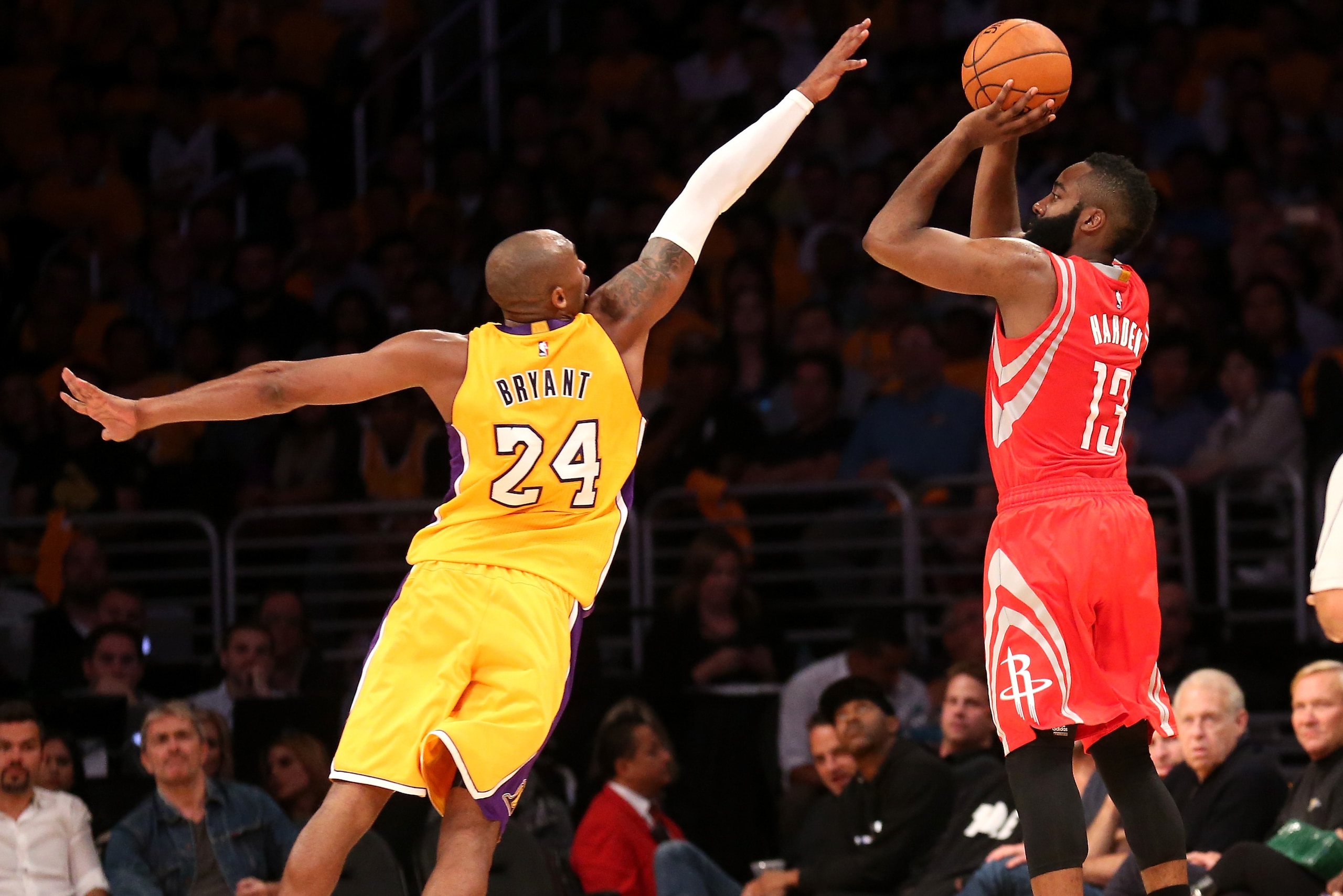 LOS ANGELES, CA - OCTOBER 28: James Harden #13 of the Houston Rockets shoots over Kobe Bryant #24 of the Los Angeles Lakers at Staples Center on October 28, 2014 in Los Angeles, California. NOTE TO USER: User expressly acknowledges and agrees that, by do LOS ANGELES, CA - OCTOBER 28: James Harden #13 of the Houston Rockets shoots over Kobe Bryant #24 of the Los Angeles Lakers at Staples Center on October 28, 2014 in Los Angeles, California. NOTE TO USER: User expressly acknowledges and agrees that, by do