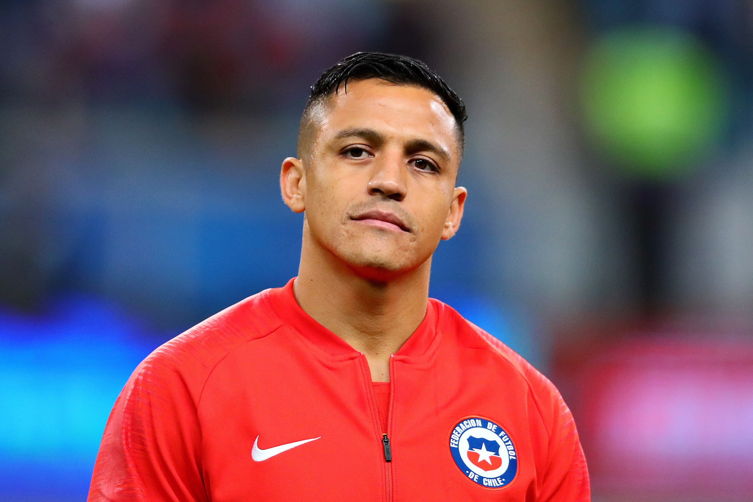 PORTO ALEGRE, BRAZIL - JULY 03: Alexis Sanchez of Chile looks on before the Copa America Brazil 2019 Semi Final match between Chile and Peru at Arena do Gremio on July 03, 2019 in Porto Alegre, Brazil. (Photo by Chris Brunskill/Fantasista/Getty Images) PORTO ALEGRE, BRAZIL - JULY 03: Alexis Sanchez of Chile looks on before the Copa America Brazil 2019 Semi Final match between Chile and Peru at Arena do Gremio on July 03, 2019 in Porto Alegre, Brazil. (Photo by Chris Brunskill/Fantasista/Getty Images)