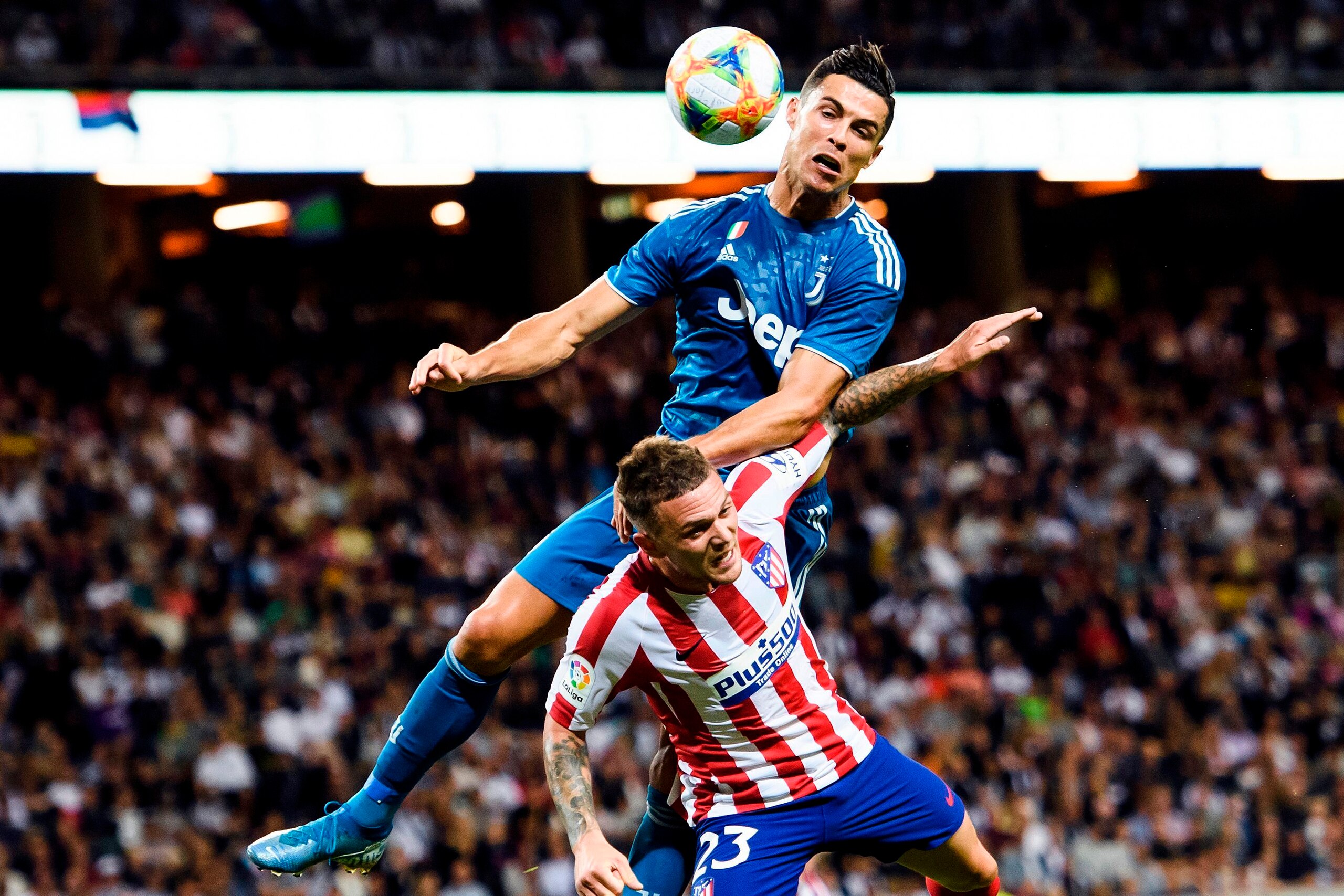 Juventus' Cristiano Ronaldo heads the ball over Atletico Madrid's Kieran Trippier during the International Champions Cup football match between Atletico Madrid v Juventus on August 10, 2019 in Solna outside Stockholm, Sweden. (Photo by Erik SIMANDER / TT Juventus' Cristiano Ronaldo heads the ball over Atletico Madrid's Kieran Trippier during the International Champions Cup football match between Atletico Madrid v Juventus on August 10, 2019 in Solna outside Stockholm, Sweden. (Photo by Erik SIMANDER / TT