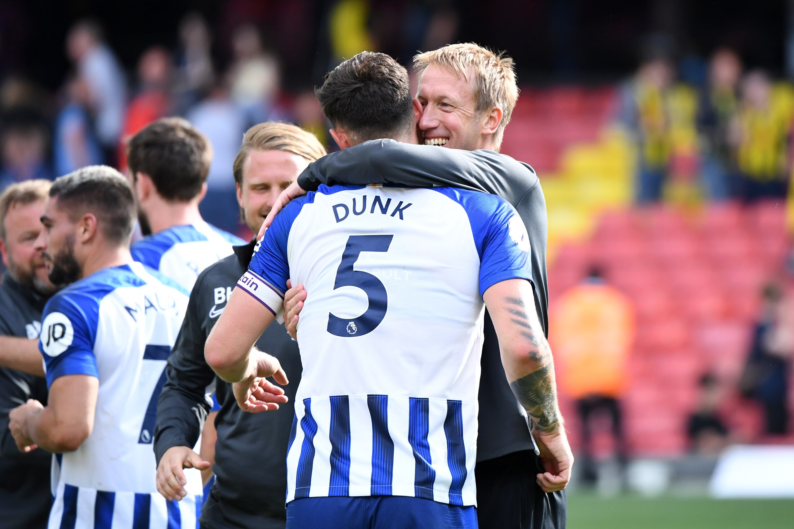WATFORD, ENGLAND - AUGUST 10: Graham Potter, Manager of Brighton and Hove Albion embraces Lewis Dunk of Brighton and Hove Albion following the Premier League match between Watford FC and Brighton & Hove Albion at Vicarage Road on August 10, 2019 in Watfor WATFORD, ENGLAND - AUGUST 10: Graham Potter, Manager of Brighton and Hove Albion embraces Lewis Dunk of Brighton and Hove Albion following the Premier League match between Watford FC and Brighton & Hove Albion at Vicarage Road on August 10, 2019 in Watfor