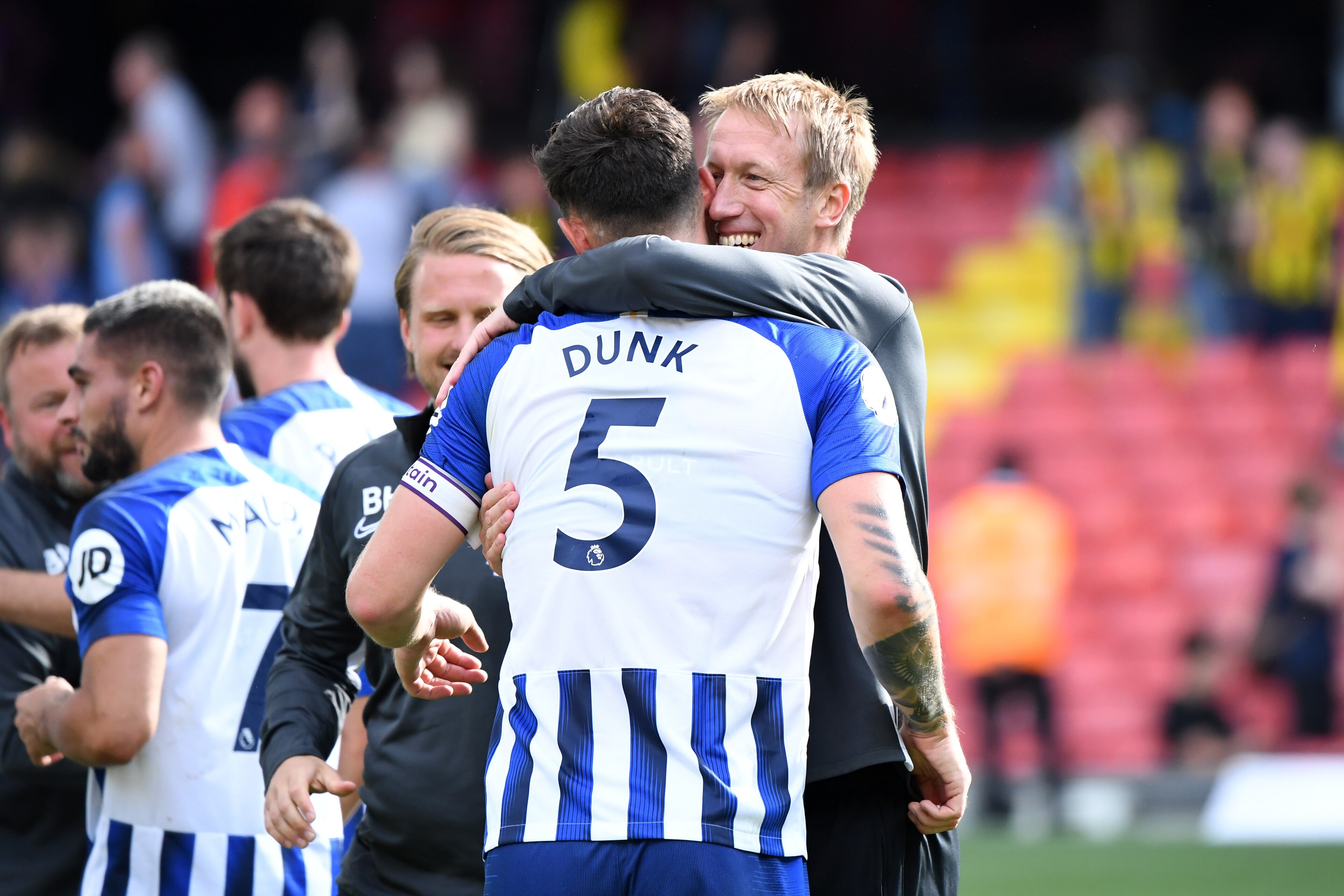 WATFORD, ENGLAND - AUGUST 10: Graham Potter, Manager of Brighton and Hove Albion embraces Lewis Dunk of Brighton and Hove Albion following the Premier League match between Watford FC and Brighton & Hove Albion at Vicarage Road on August 10, 2019 in Watfor WATFORD, ENGLAND - AUGUST 10: Graham Potter, Manager of Brighton and Hove Albion embraces Lewis Dunk of Brighton and Hove Albion following the Premier League match between Watford FC and Brighton & Hove Albion at Vicarage Road on August 10, 2019 in Watfor