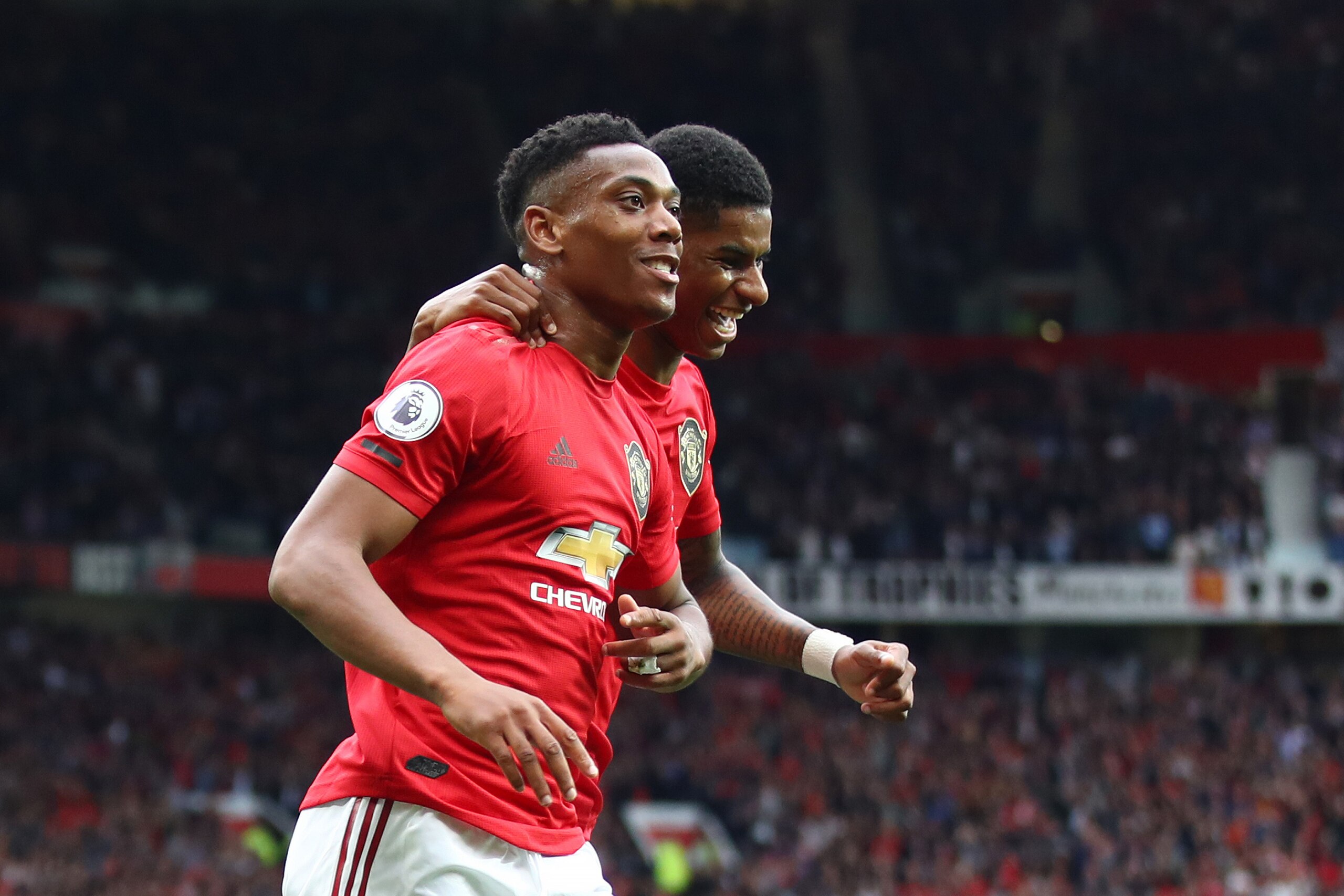 MANCHESTER, ENGLAND - AUGUST 11: Anthony Martial of Manchester United celebrates with teammate Marcus Rashford after scoring his team's second goal during the Premier League match between Manchester United and Chelsea FC at Old Trafford on August 11, 2019 MANCHESTER, ENGLAND - AUGUST 11: Anthony Martial of Manchester United celebrates with teammate Marcus Rashford after scoring his team's second goal during the Premier League match between Manchester United and Chelsea FC at Old Trafford on August 11, 2019