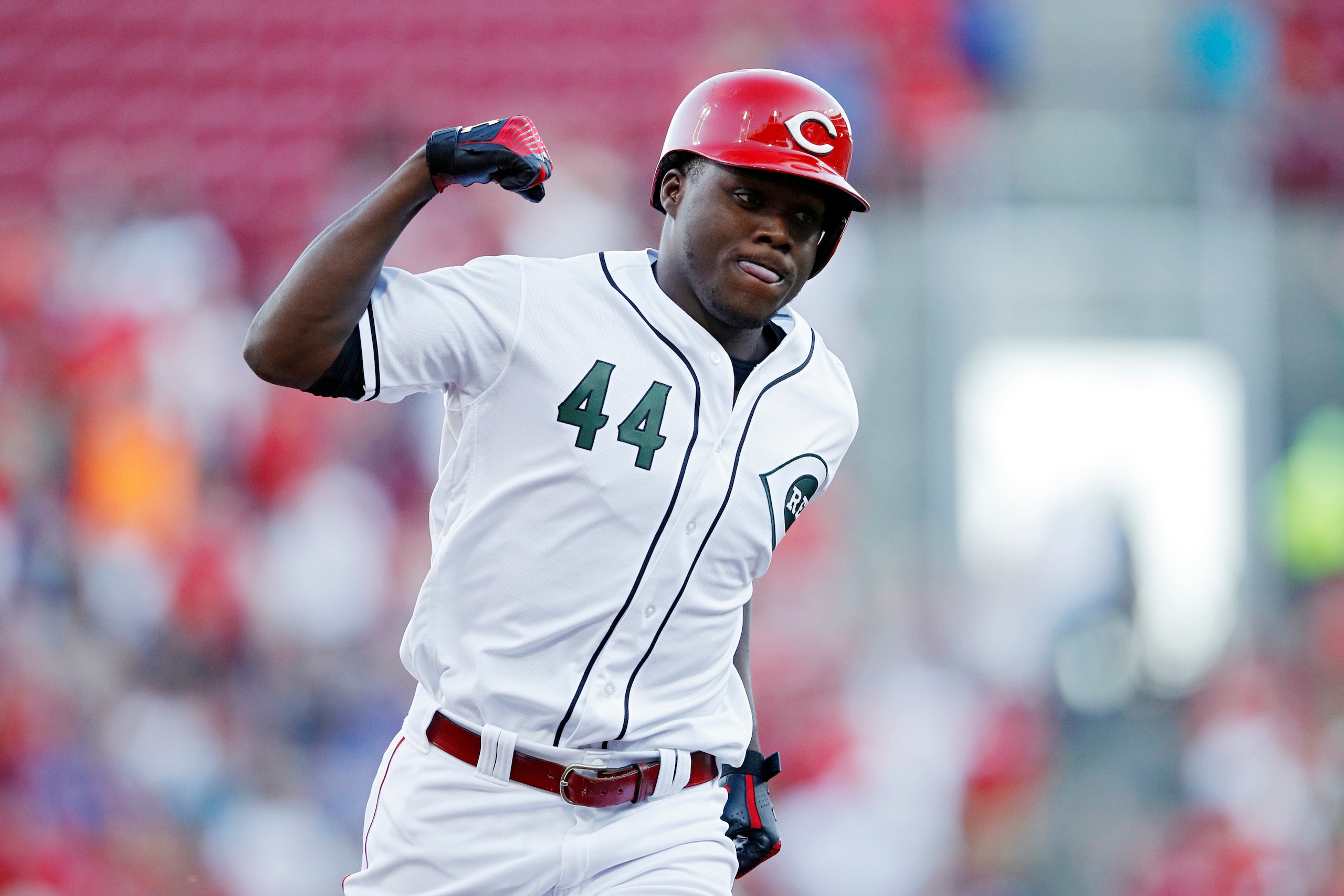 CINCINNATI, OH - AUGUST 09: Aristides Aquino #44 of the Cincinnati Reds reacts after a two-run home run in the second inning against the Chicago Cubs at Great American Ball Park on August 9, 2019 in Cincinnati, Ohio. (Photo by Joe Robbins/Getty Images)