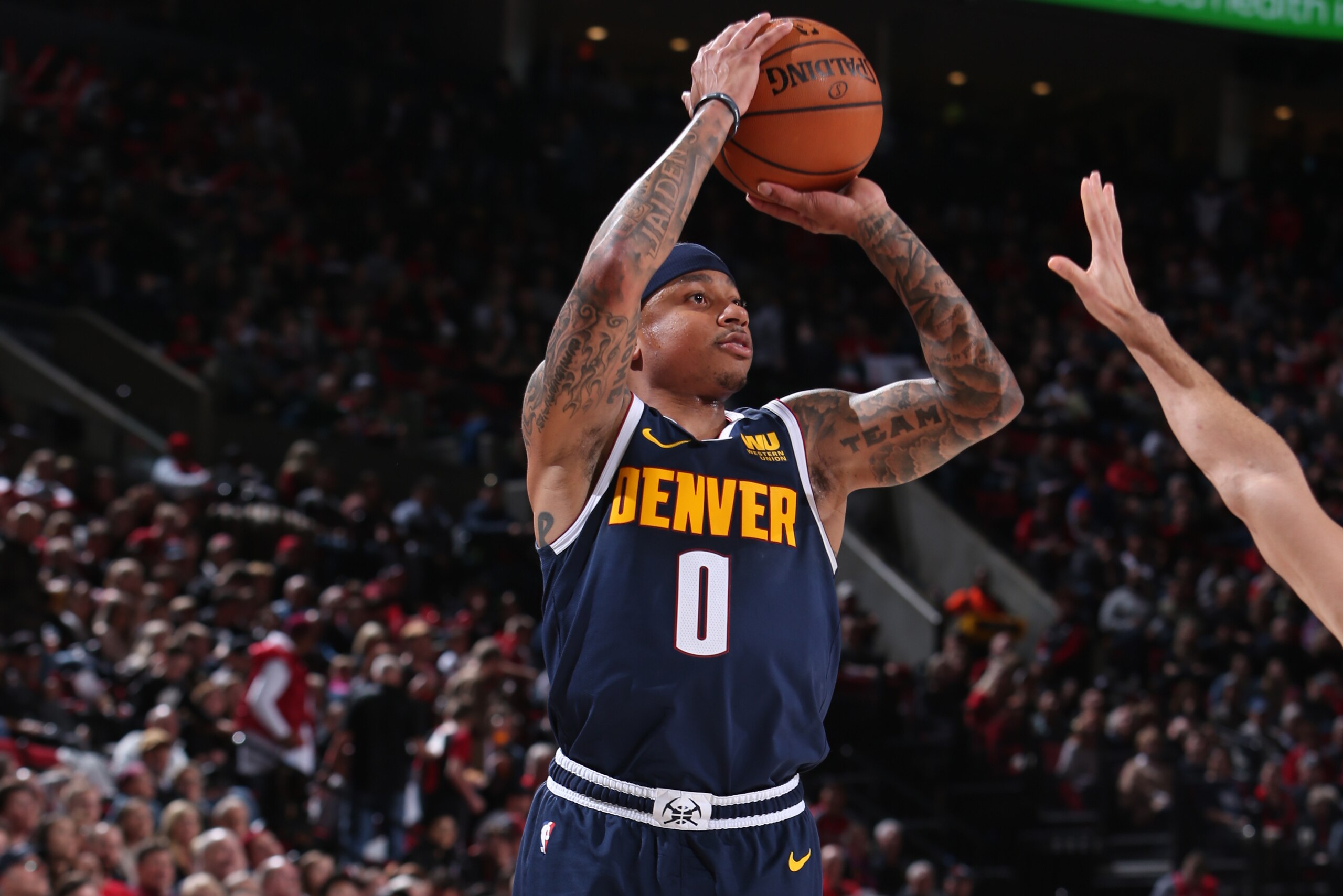 PORTLAND, OR - APRIL 7: Isaiah Thomas #0 of the Denver Nuggets shoots the ball against the Portland Trail Blazers on April 7, 2019 at the Moda Center in Portland, Oregon. NOTE TO USER: User expressly acknowledges and agrees that, by downloading and/or usi