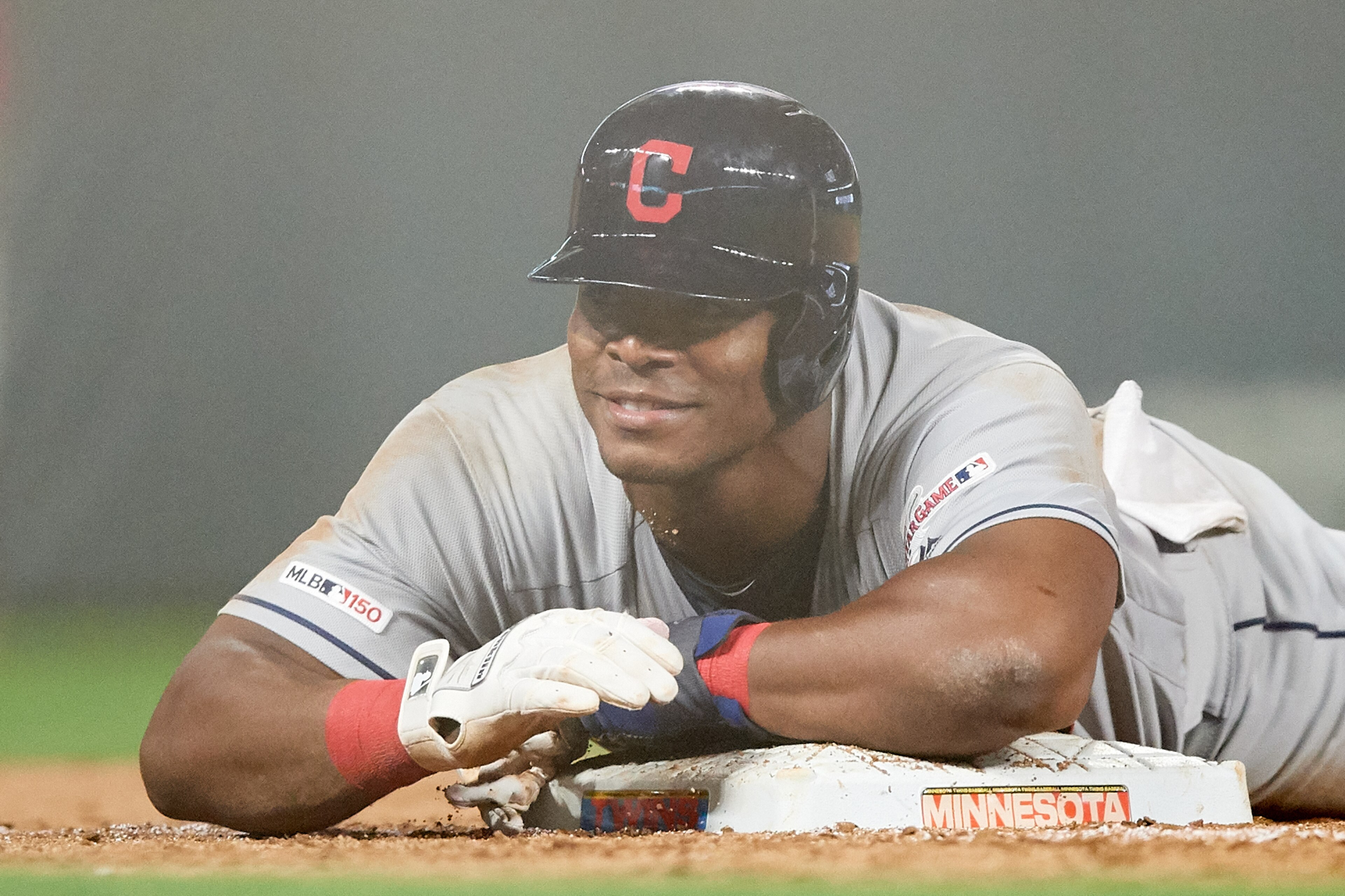 MINNEAPOLIS, MN - AUGUST 09: Yasiel Puig #66 of the Cleveland Indians slides into third base against the Minnesota Twins during the game on August 9, 2019 at Target Field in Minneapolis, Minnesota. The Indians defeated the Twins 6-2. (Photo by Hannah Fosl MINNEAPOLIS, MN - AUGUST 09: Yasiel Puig #66 of the Cleveland Indians slides into third base against the Minnesota Twins during the game on August 9, 2019 at Target Field in Minneapolis, Minnesota. The Indians defeated the Twins 6-2. (Photo by Hannah Fosl