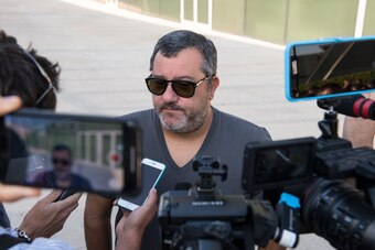 TURIN, ITALY - JULY 17: Agent Mino Raiola accompanies Matthijs De Ligt as he arrives in Turin ahead of his signing with Juventus FC on July 17, 2019 in Turin, Italy. (Photo by Stefano Guidi/Getty Images)