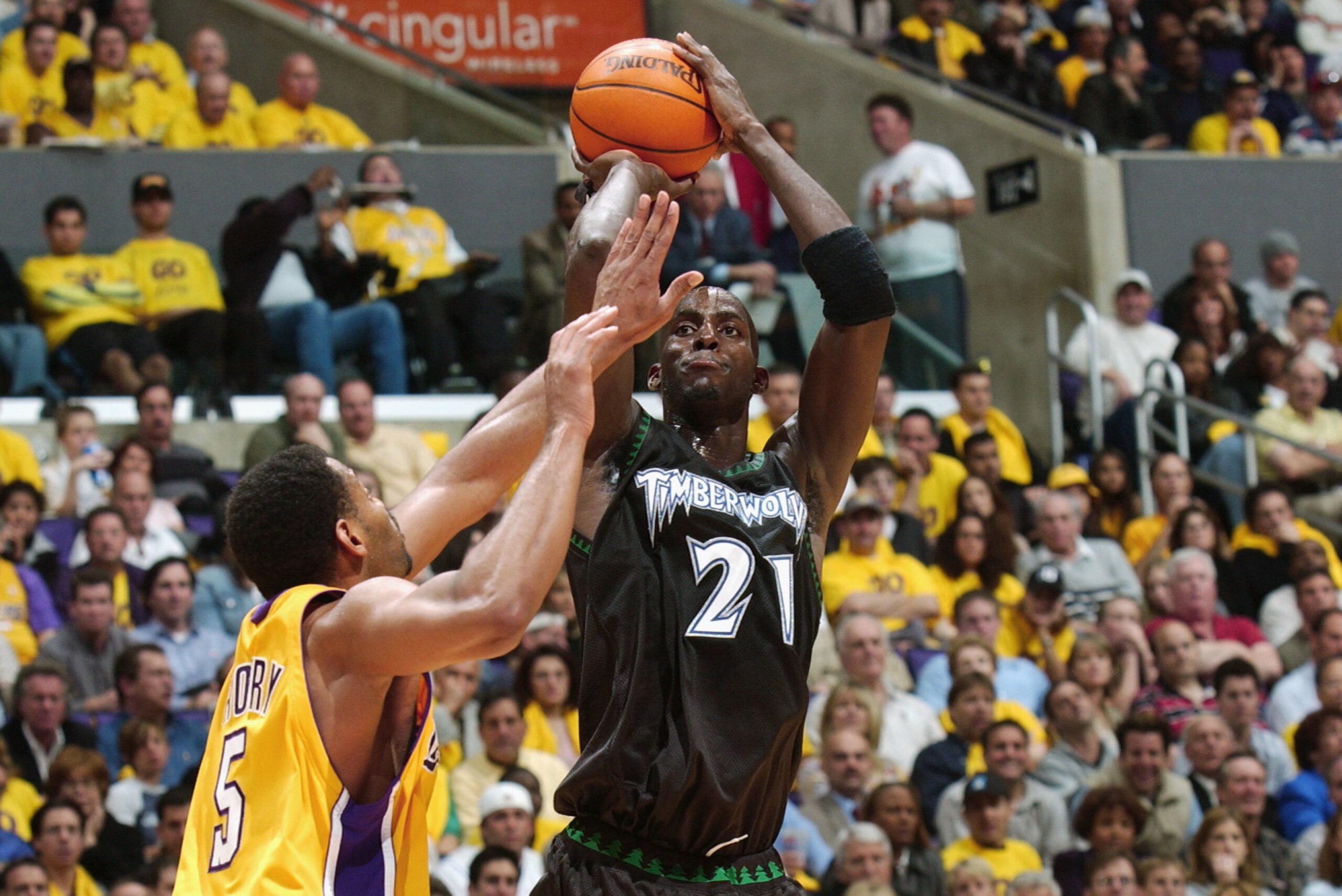 LOS ANGELES - MAY 1:  Kevin Garnett #21 of the Minnesota Timberwolves shoots over Robert Horry #5 of the Los Angeles Lakers in Game six of the Western Conference Quarterfinals during the 2003 NBA Playoffs at Staples Center on May 1, 2003 in Los Angeles, C