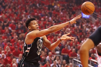 TORONTO, ONTARIO - MAY 25: Giannis Antetokounmpo #34 of the Milwaukee Bucks passes the ball during the first half against the Toronto Raptors in game six of the NBA Eastern Conference Finals at Scotiabank Arena on May 25, 2019 in Toronto, Canada. NOTE TO 