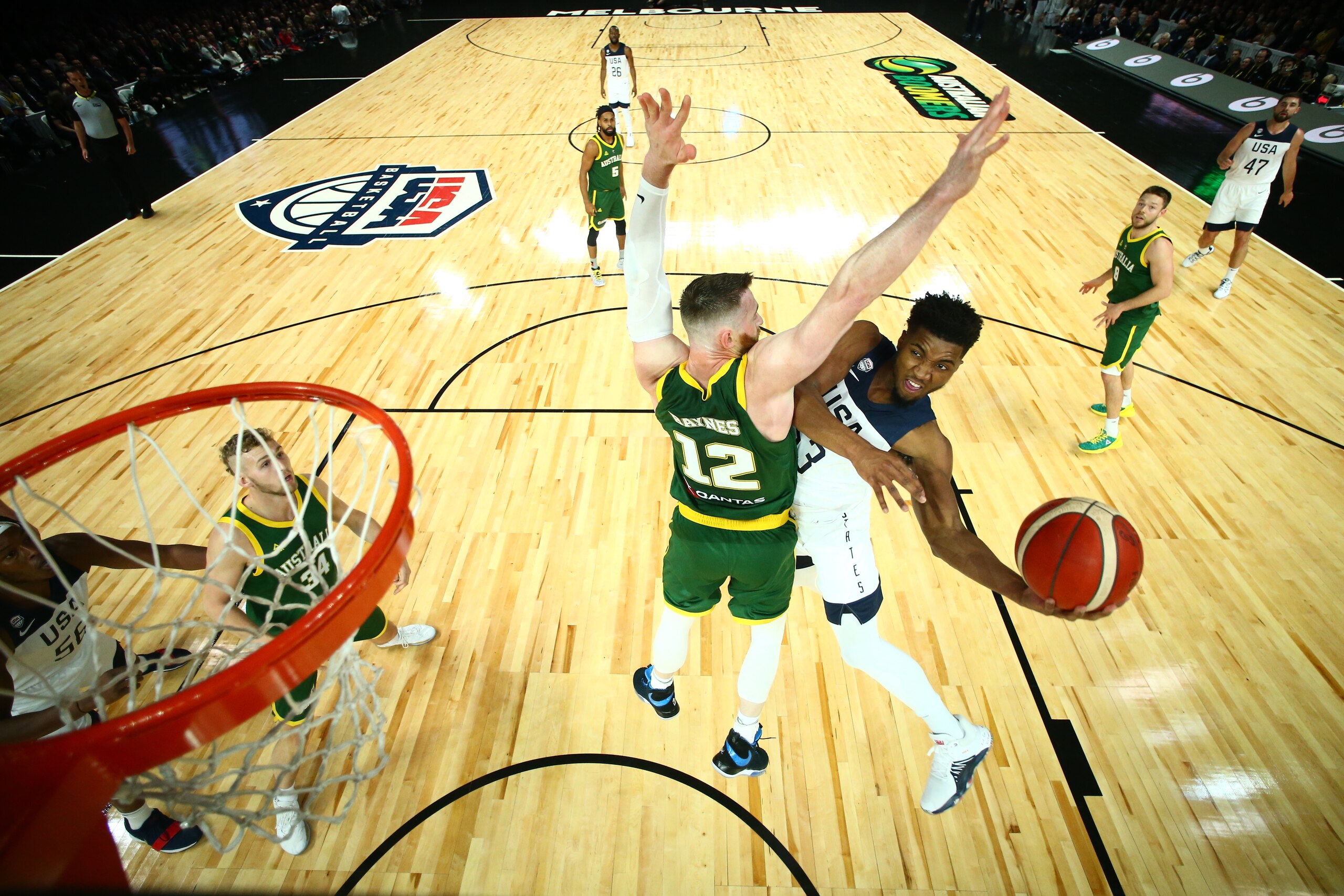 MELBOURNE, AUS - AUGUST 22: Donovan Mitchell #53 of Team USA shoots the contested shot against the Australia Boomers on August 22, 2019 at Marvel Stadium in Melbourne, Australia. NOTE TO USER: User expressly acknowledges and agrees that, by downloading an