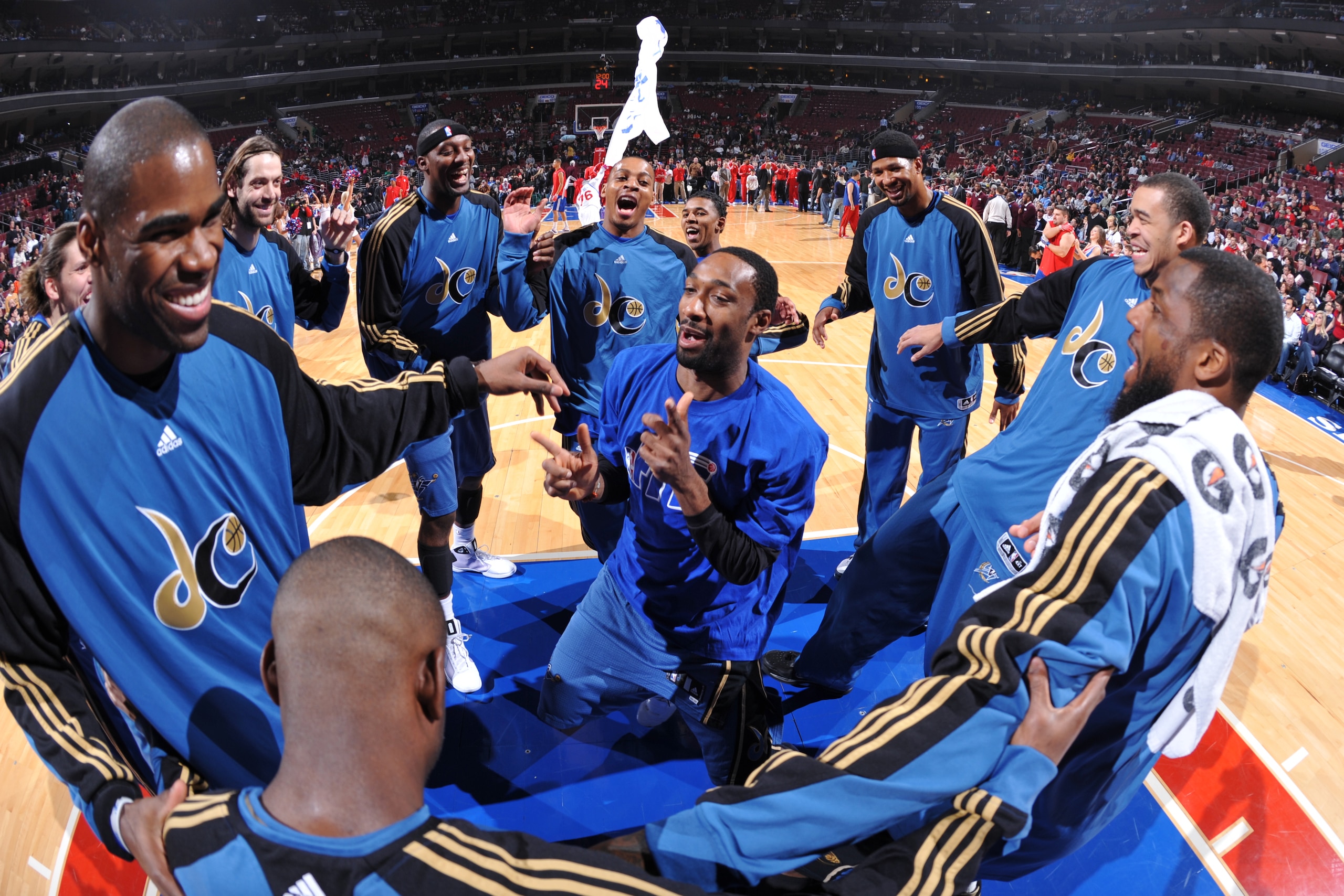 PHILADELPHIA - JANUARY 5: Gilbert Arenas #0 of the Washington Wizards gestures in the huddle with teammates before the game against the Philadelphia 76ers on January 5, 2010 at the Wachovia Center in Philadelphia, Pennsylvania. NOTE TO USER: User expres PHILADELPHIA - JANUARY 5: Gilbert Arenas #0 of the Washington Wizards gestures in the huddle with teammates before the game against the Philadelphia 76ers on January 5, 2010 at the Wachovia Center in Philadelphia, Pennsylvania. NOTE TO USER: User expres