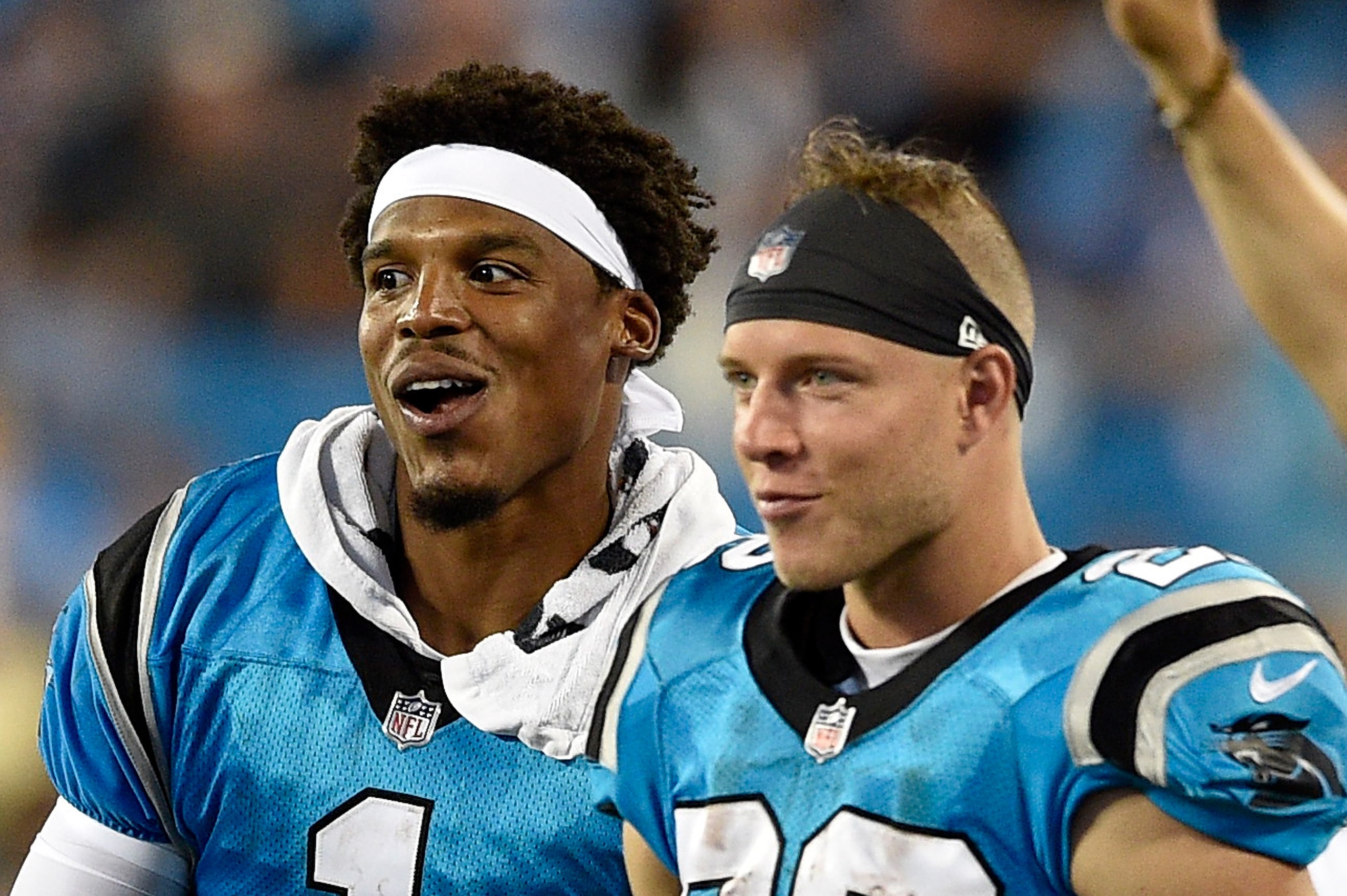 CHARLOTTE, NC - AUGUST 17:  Cam Newton #1 and teammate Christian McCaffrey #22 of the Carolina Panthers react after a third quarter touchdown against the Miami Dolphins during the game at Bank of America Stadium on August 17, 2018 in Charlotte, North Caro