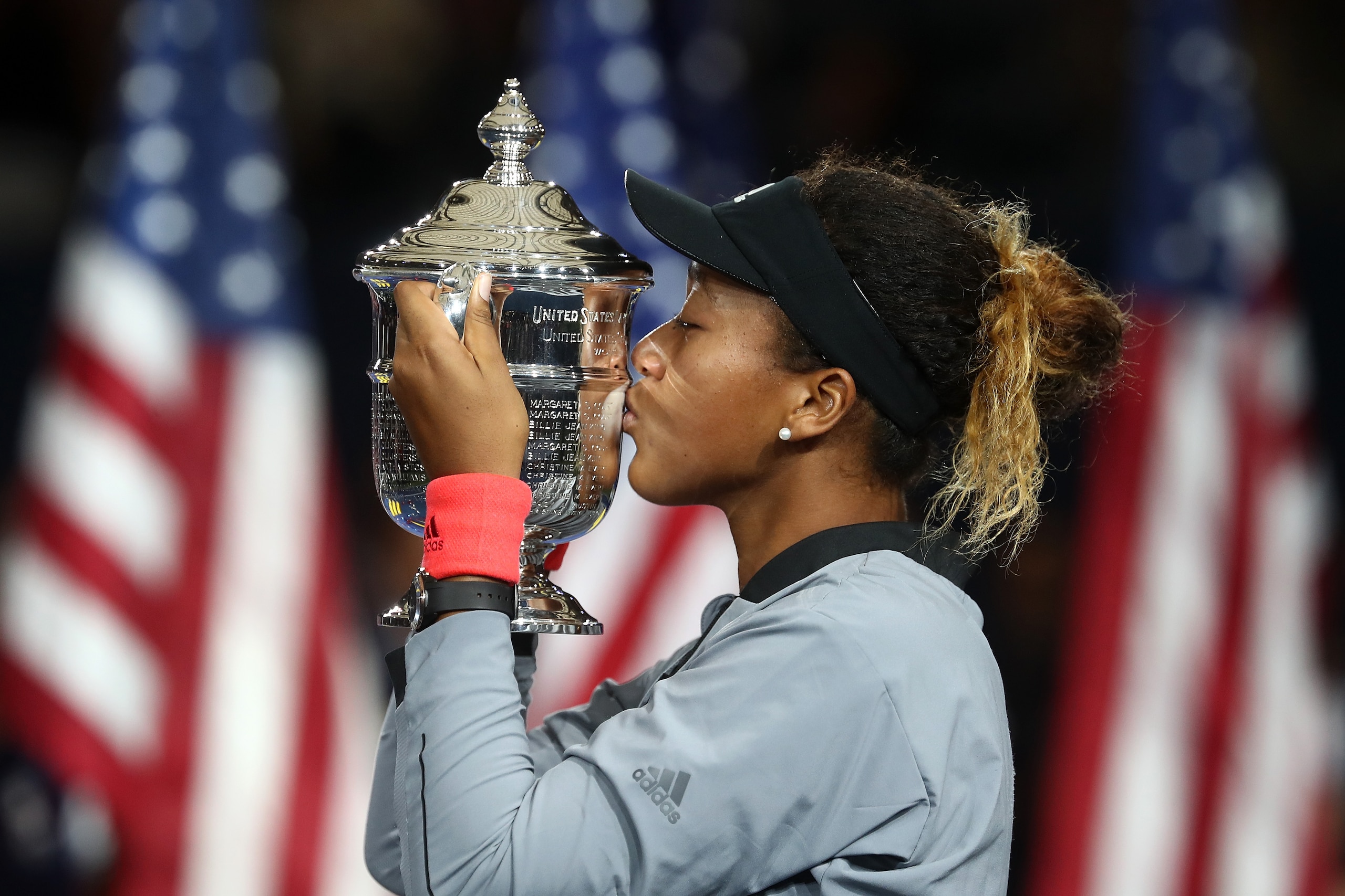 NEW YORK, NY - SEPTEMBER 08:  Naomi Osaka of Japan poses with the championship trophy after winning the Women's Singles finals match against Serena Williams of the United States on Day Thirteen of the 2018 US Open at the USTA Billie Jean King National Ten