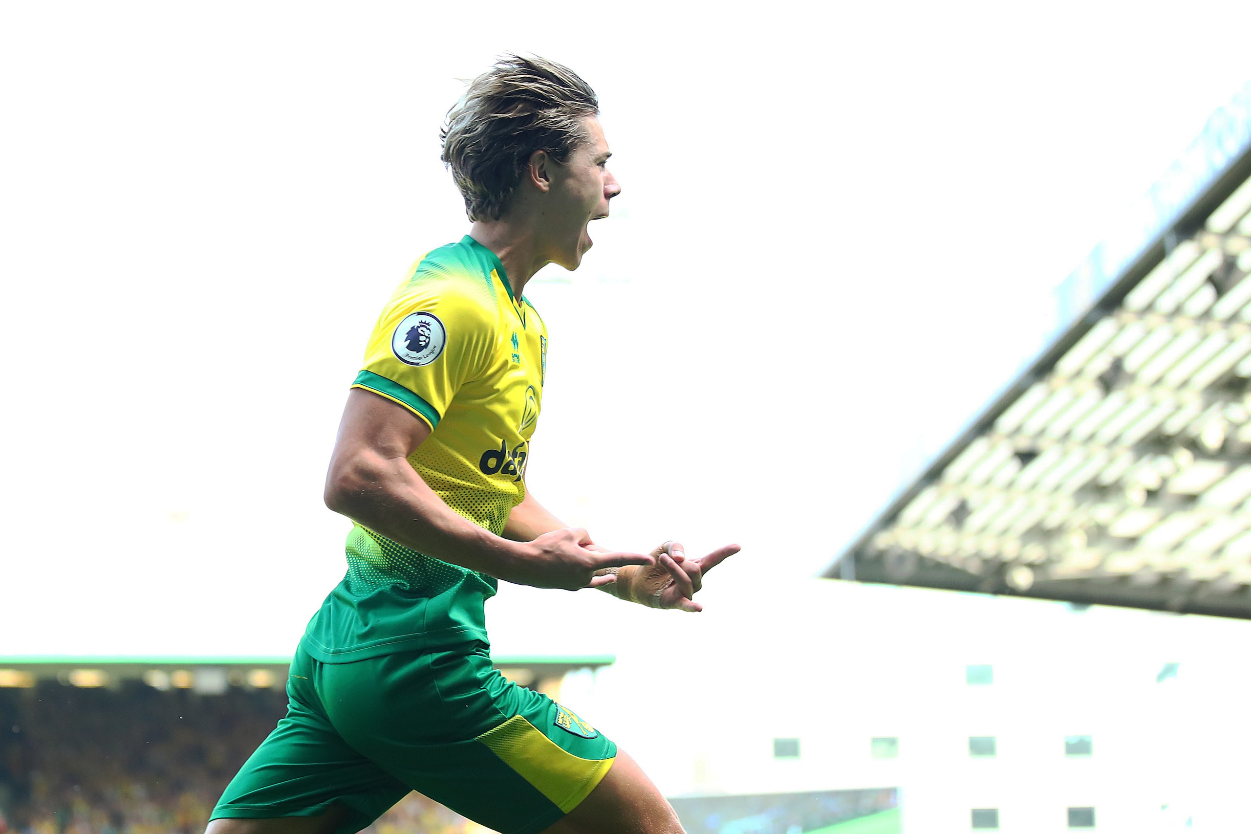 NORWICH, ENGLAND - AUGUST 24: Todd Cantwell of Norwich celebrates scoring to make it 1-1 during the Premier League match between Norwich City and Chelsea FC at Carrow Road on August 24, 2019 in Norwich, United Kingdom. (Photo by Julian Finney/Getty Images