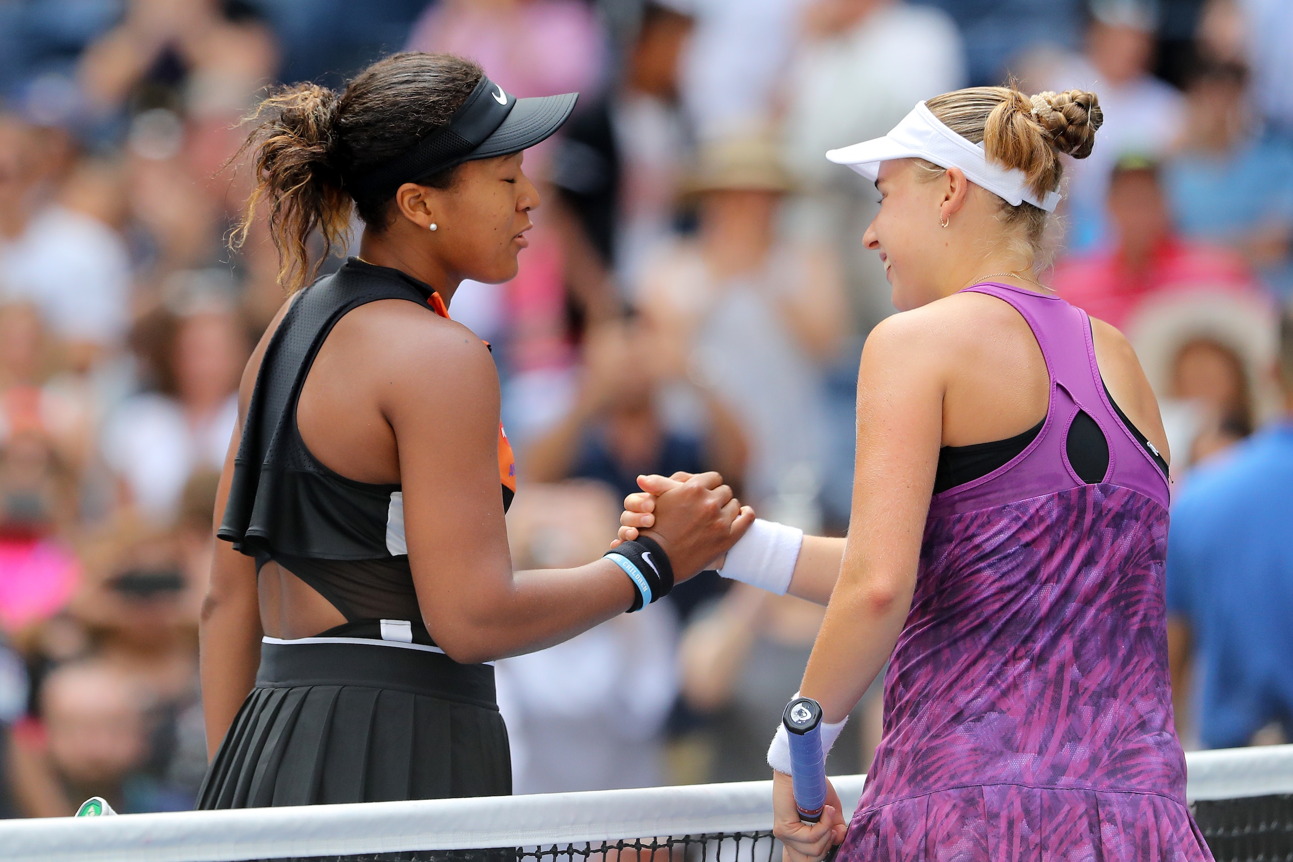NEW YORK, NEW YORK - AUGUST 27:  Naomi Osaka of Japan and Anna Blinkova of Russia shake hands after their Women's Singles first round match on day two of the 2019 US Open at the USTA Billie Jean King National Tennis Center on August 27, 2019 in the Flushi