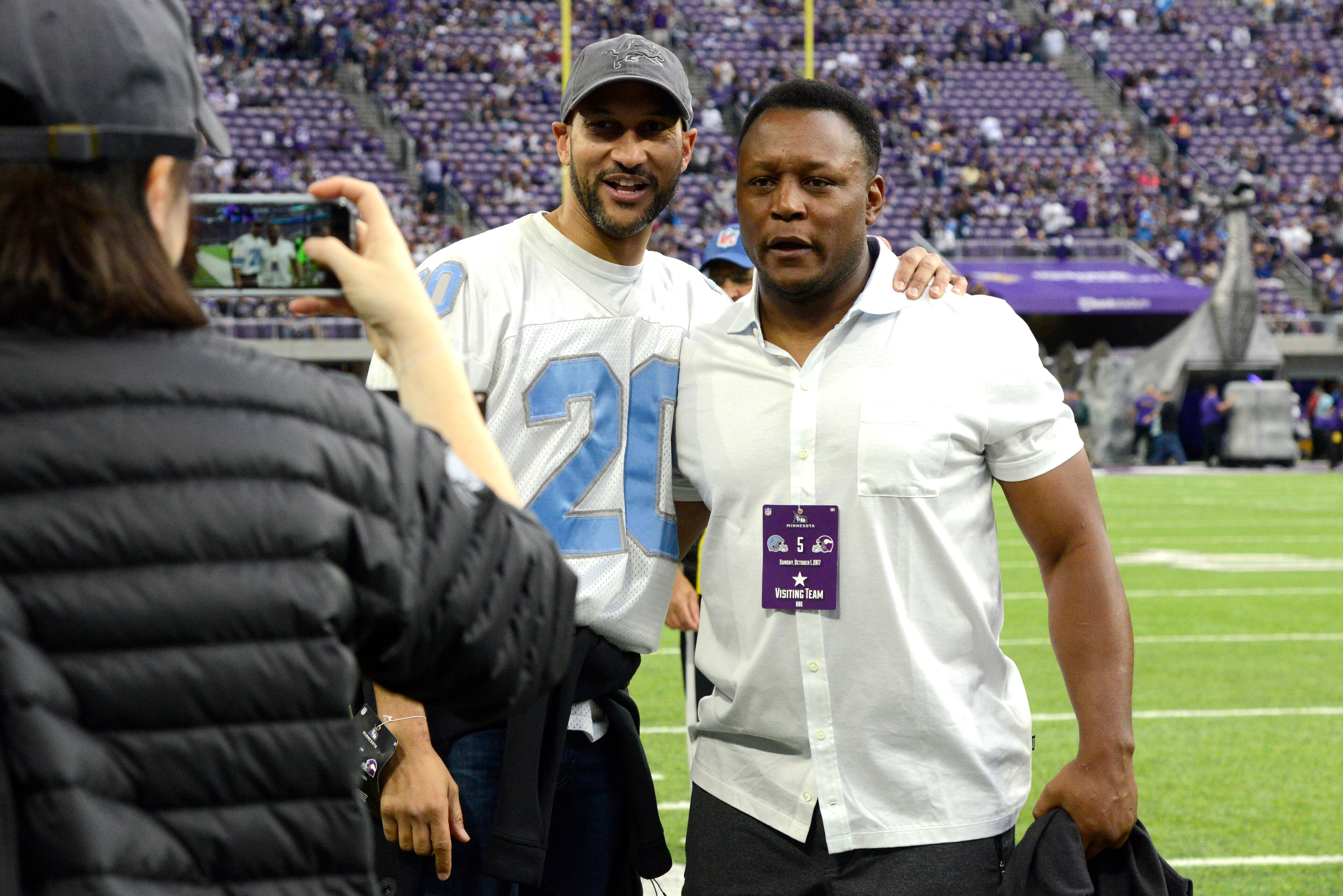 MINNEAPOLIS, MN - OCTOBER 1: Actor Keegan-Michael Key takes a photograph with former Detroit Lions running back Barry Sanders on the sidelines before the game between the Lions and the Minnesota Vikings on October 1, 2017 at U.S. Bank Stadium in Minneapol MINNEAPOLIS, MN - OCTOBER 1: Actor Keegan-Michael Key takes a photograph with former Detroit Lions running back Barry Sanders on the sidelines before the game between the Lions and the Minnesota Vikings on October 1, 2017 at U.S. Bank Stadium in Minneapol