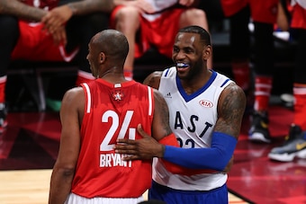 TORONTO, ON - FEBRUARY 14: Kobe Bryant #24 of the Los Angeles Lakers and the Western Conference and LeBron James #23 of the Cleveland Cavaliers and the Eastern Conference laugh after a play in the first half during the NBA All-Star Game 2016 at the Air Ca