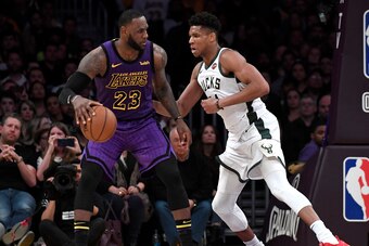 LOS ANGELES, CALIFORNIA - MARCH 01: LeBron James #23 of the Los Angeles Lakers is guraded by Giannis Antetokounmpo #34 of the Milwaukee Bucks during the game at Staples Center on March 01, 2019 in Los Angeles, California. NOTE TO USER: User expressly ackn
