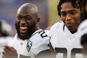 BALTIMORE, MD - AUGUST 08: Leonard Fournette #27 laughs with Jalen Ramsey #20 of the Jacksonville Jaguars against the Baltimore Ravens during the first half of a preseason game at M&T Bank Stadium on August 08, 2019 in Baltimore, Maryland. (Photo by Scott
