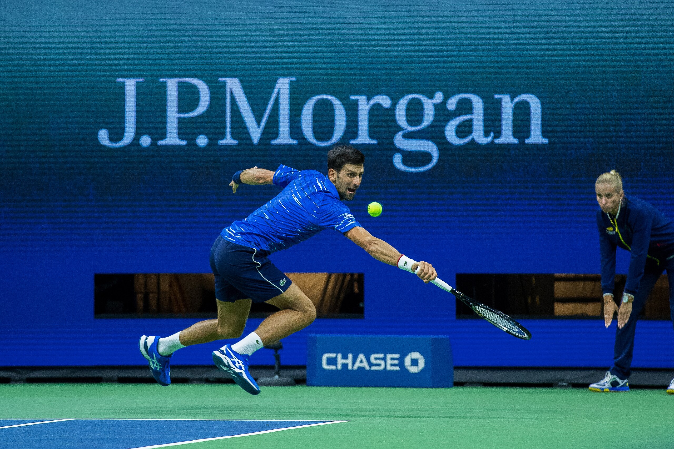 NEW YORK, NEW YORK - AUGUST 28: Novak Djokovic of Serbia returns a shot during his Men's Singles second round match against against Juan Ignacio Londero of Argentina on day three of the 2019 US Open at USTA Billie Jean King National Tennis Center on Augus