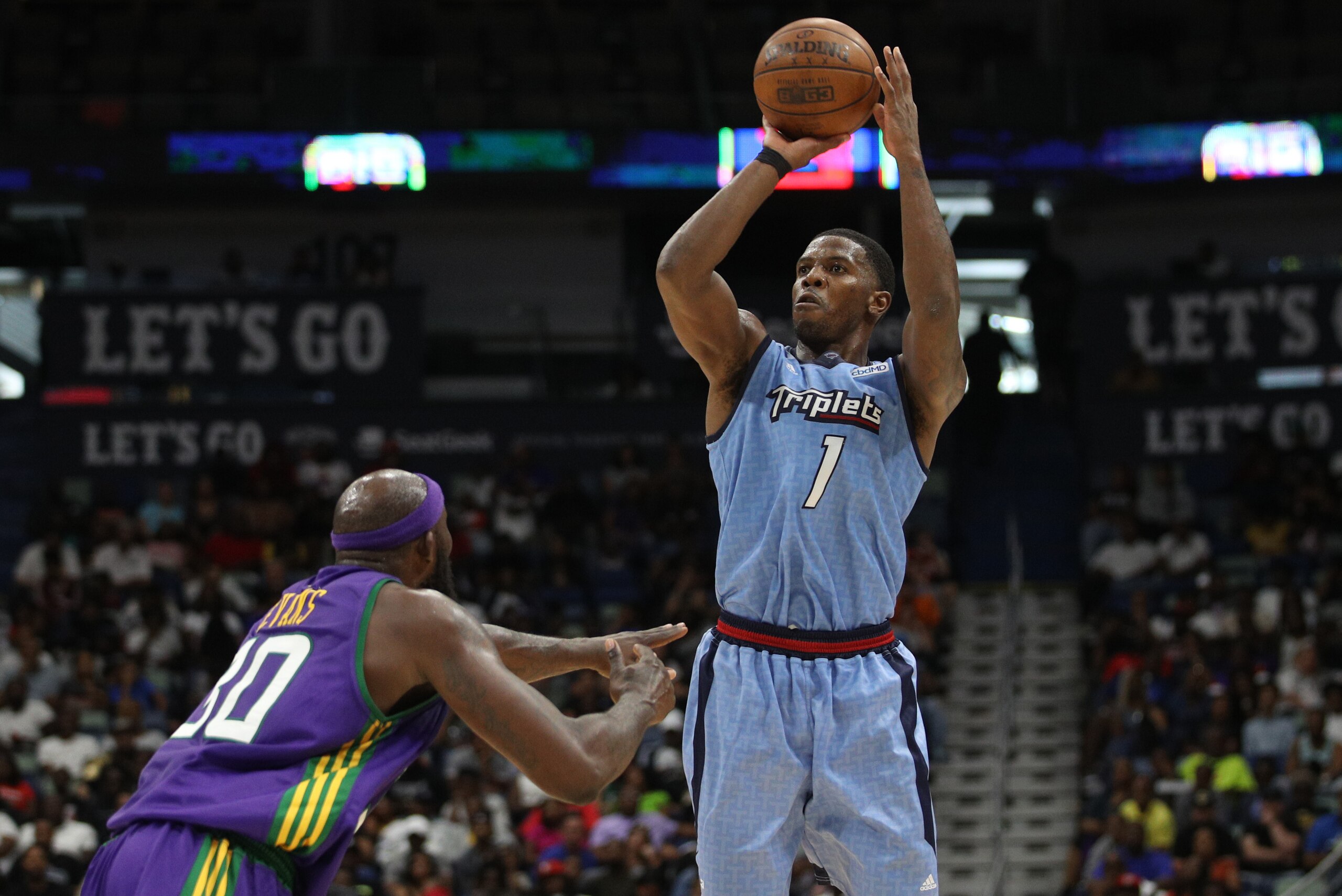 NEW ORLEANS, LOUISIANA - AUGUST 25: Joe Johnson #1 of the Triplets shoots over Reggie Evans #30 of the 3 Headed Monsters during the BIG3 Playoffs at Smoothie King Center on August 25, 2019 in New Orleans, Louisiana. (Photo by Chris Graythen/BIG3 via Getty