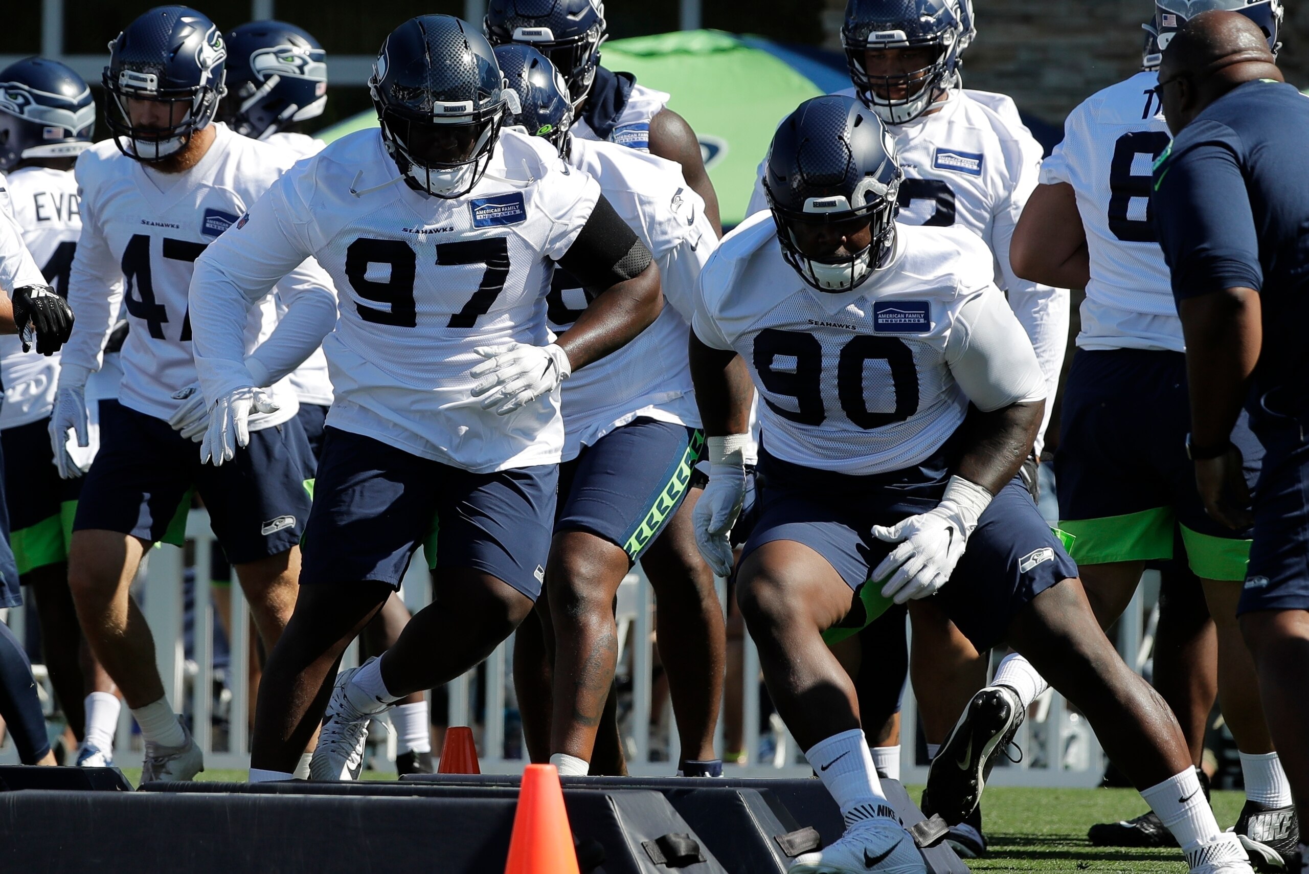 Seattle Seahawks defensive tackle Poona Ford (97) and Jarran Reed (90) Seattle Seahawks defensive tackle Poona Ford (97) and Jarran Reed (90)